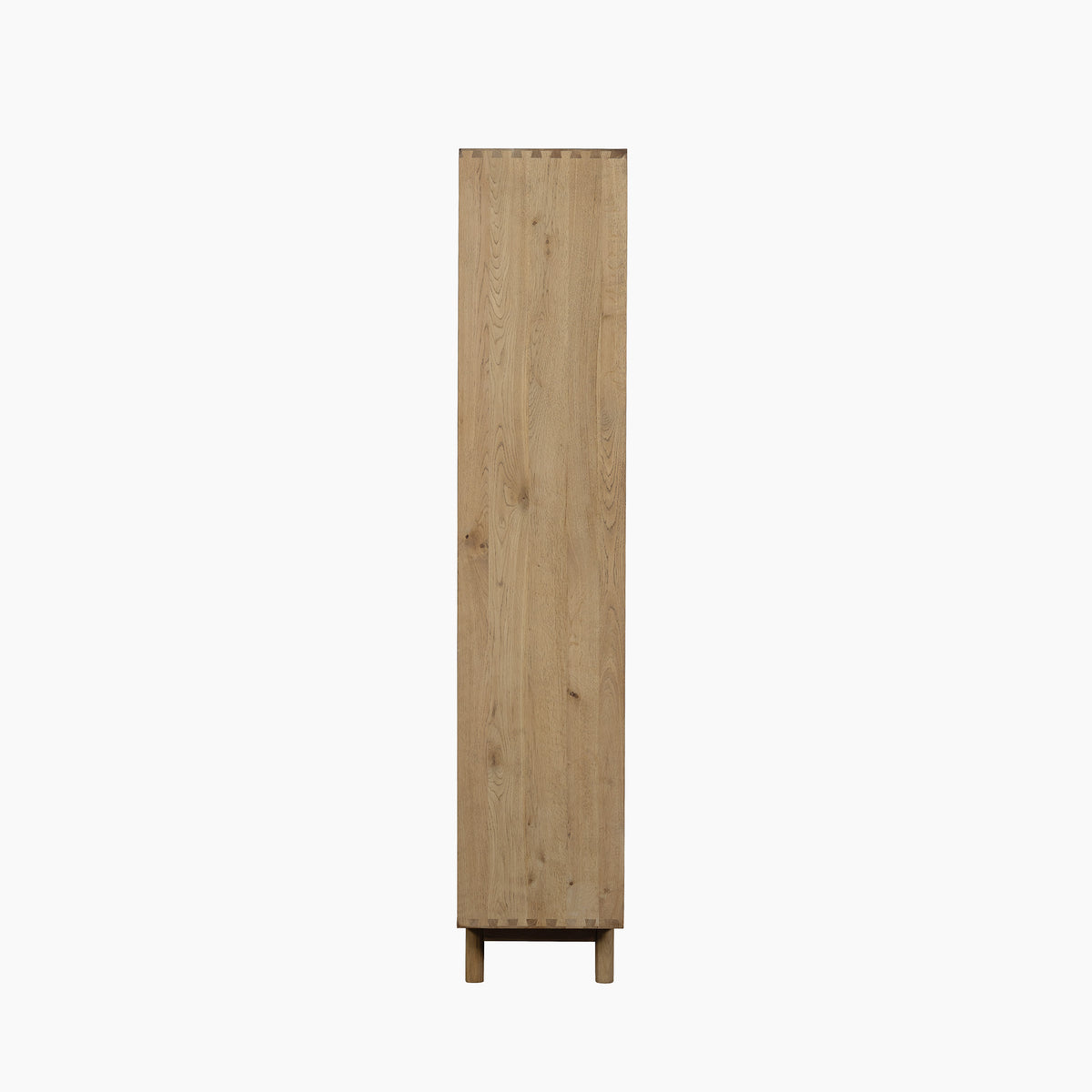 Viewed from the side against a white background, the Oslo Display Cabinet in Light Oak is a tall, narrow wooden piece with a plain front, bringing understated elegance to modern interiors.