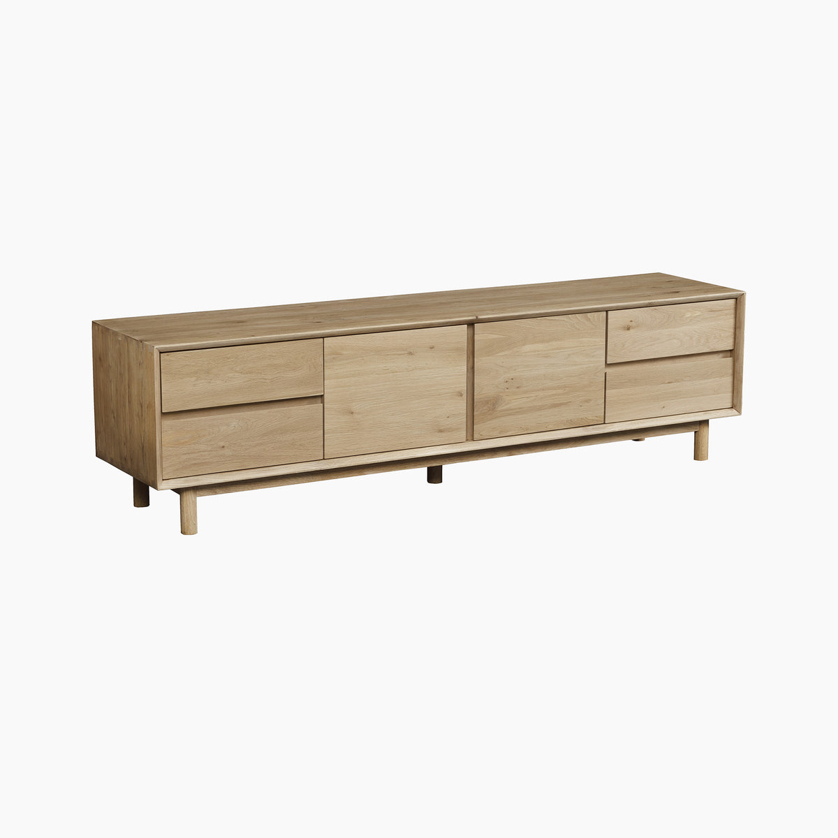 Introducing the Oslo TV Unit in Light Oak—a minimalist, modern TV stand with two cabinets and three drawers, inspired by Scandinavian design trends. This solid oak media cabinet is perfect for your contemporary living room, seamlessly blending functionality with stylish appeal.