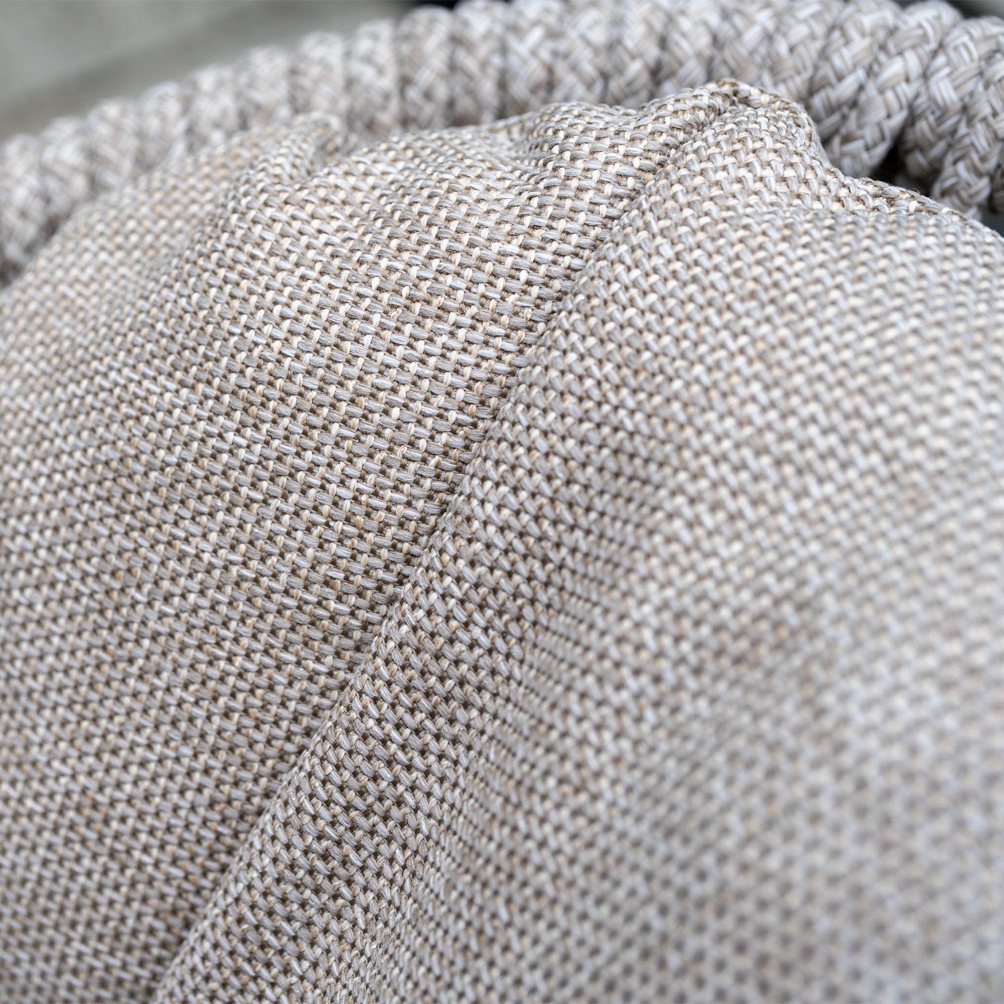 Close-up of the textured beige cushion with visible stitching and detailed fibers, designed to complement the Pello 4 Seat Round Dining Set with Albatross Table in Fawn or other outdoor dining furniture.