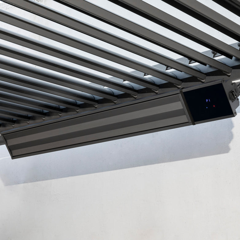 The PergoSTET Premium Wifi & Bluetooth Heater in Black is mounted beneath a slatted metal ceiling on a white wall, ideal for outdoor heating and perfect for pergolas from Harbour Lifestyle.