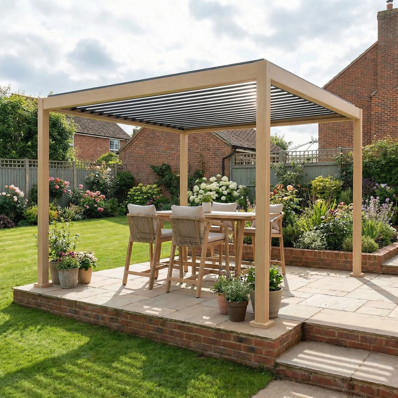 PergoSTET Lite 3m x 3m Metal Square Pergola with Wood Effect featuring integrated drainage shown over an outdoor dining set on a stone patio, surrounded by garden and lawn in a backyard.