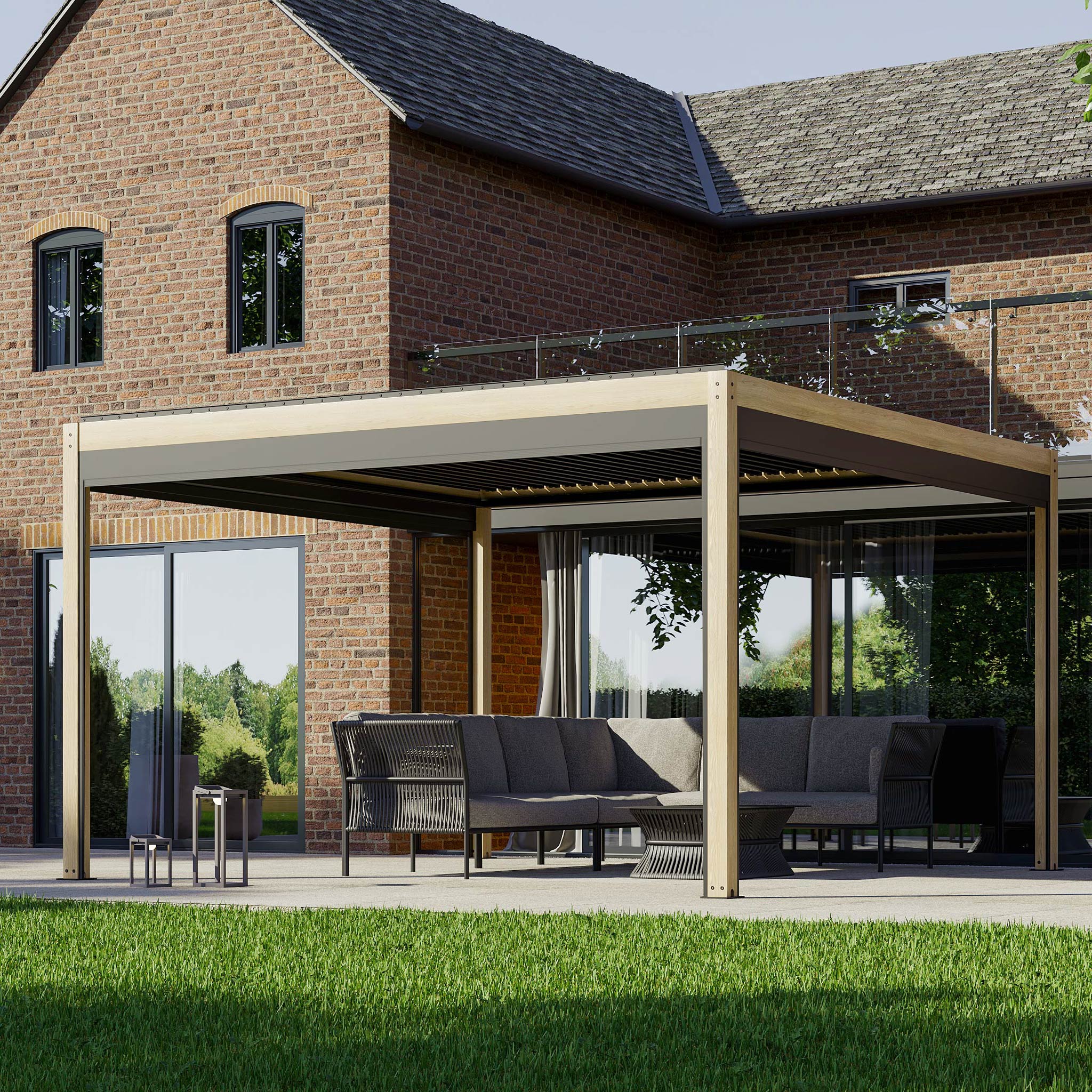 A contemporary patio showcases the PergoSTET Plus 4m x 4m Square Pergola with LED Lighting and Wood Effect - Frame Only, offering stylish outdoor seating. It pairs beautifully with a charming brick house and a lush green lawn in the background.