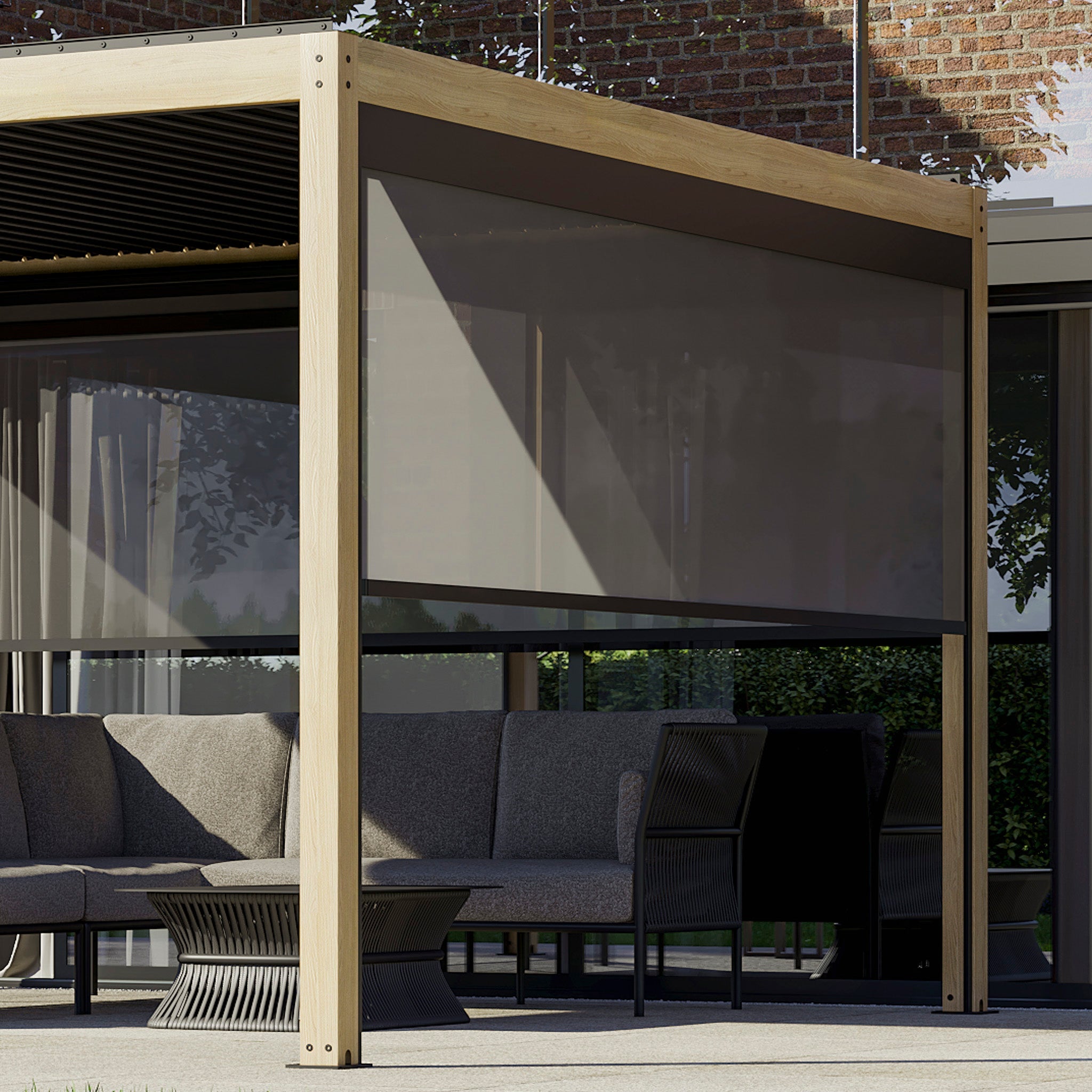 A contemporary outdoor patio showcases a PergoSTET Plus 3m x 3m Square Pergola with LED Lighting and Wood Effect, accentuating the gray sectional sofa and black chairs against a brick wall. This modern pergola also includes a built-in drainage system.
