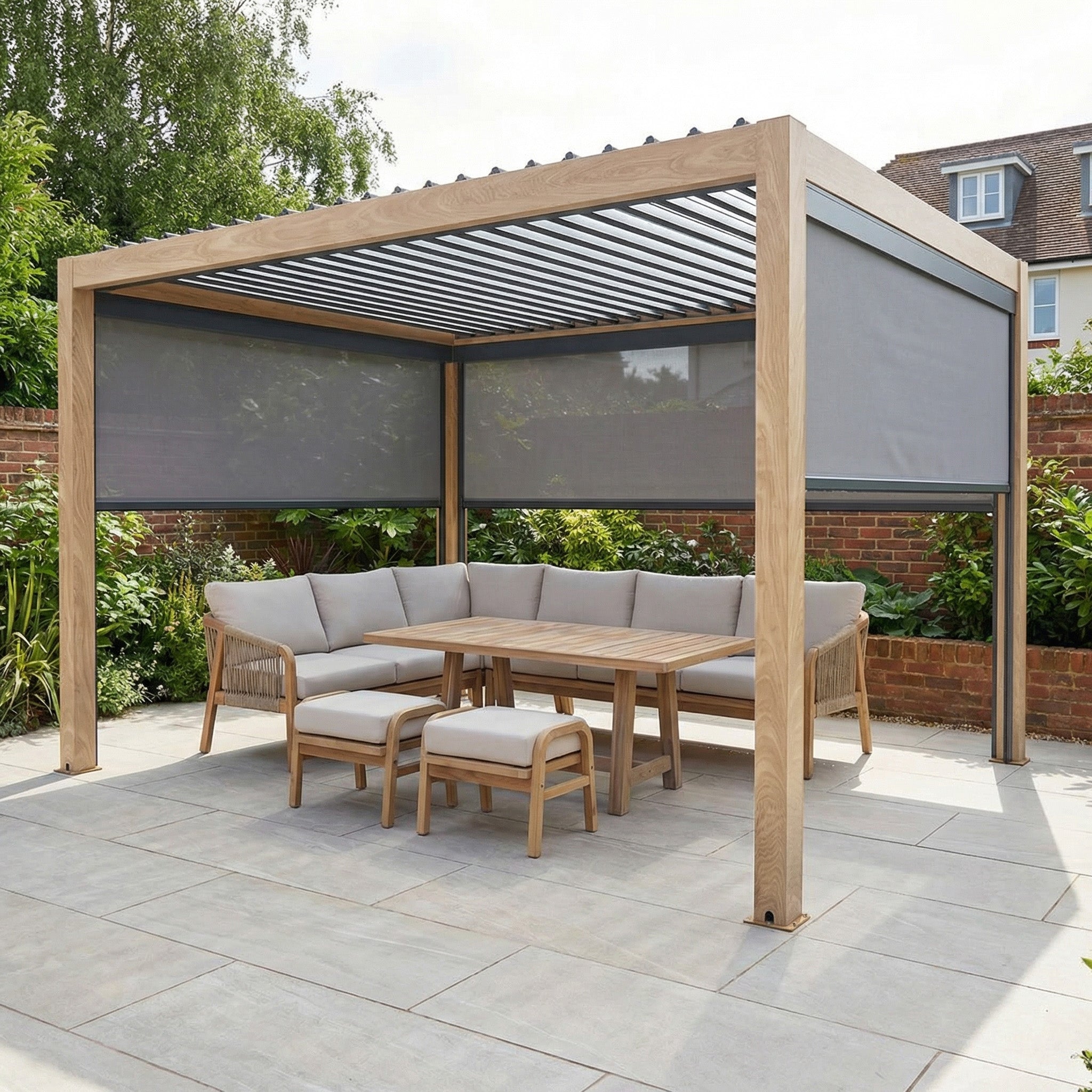 The PergoSTET Plus 3m x 4m Rectangular Pergola features wood-effect design, LED lighting, and 3 manual side blinds, perfect for a modern patio setup with a corner sofa, table, stools, and tiled flooring.