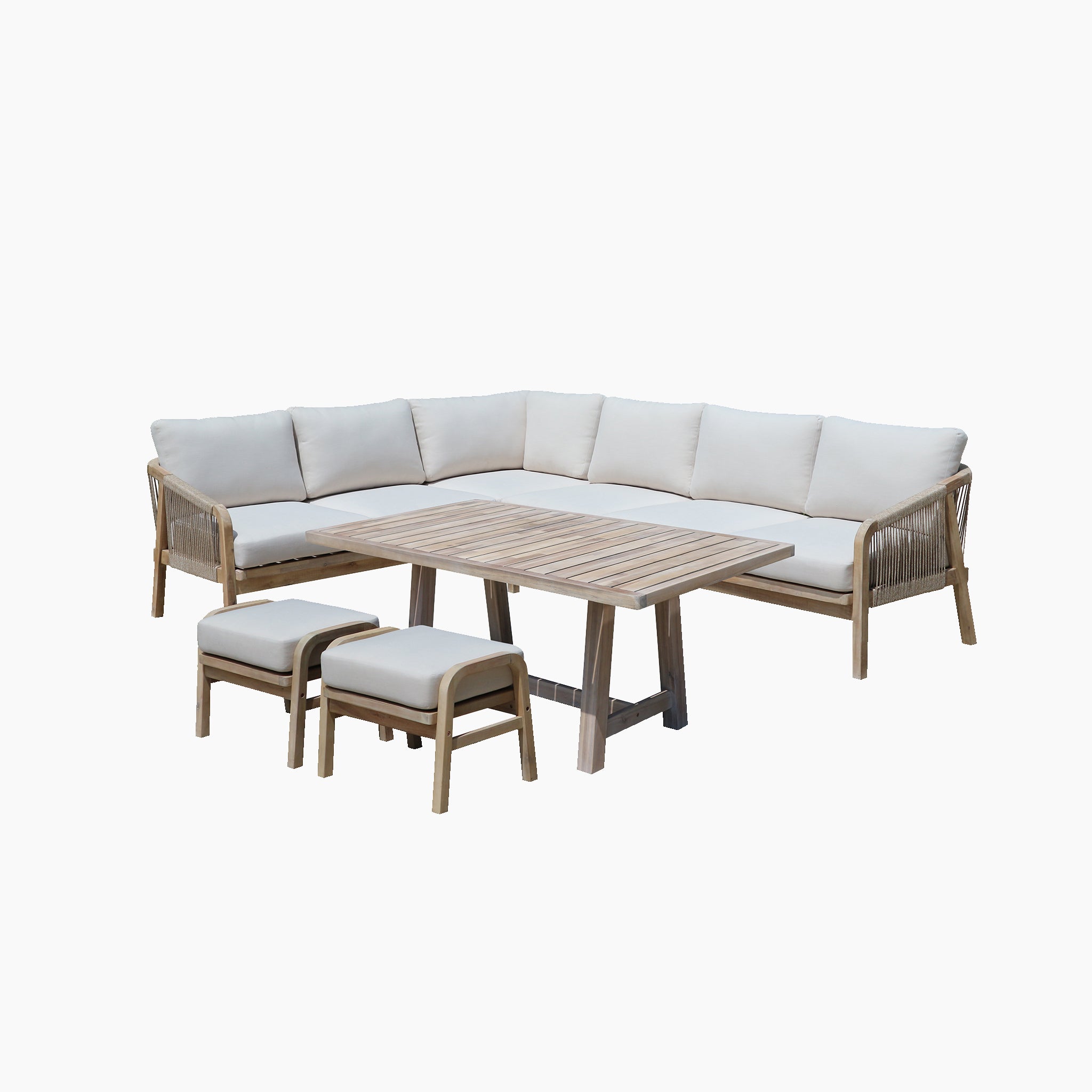 Introducing the Quay Corner Dining Set in Linen, which includes an outdoor corner sofa with beige cushions made from water-resistant polyester fabric, a rectangular wooden table crafted from sustainably sourced acacia wood, and two matching stools, all set against a white background.