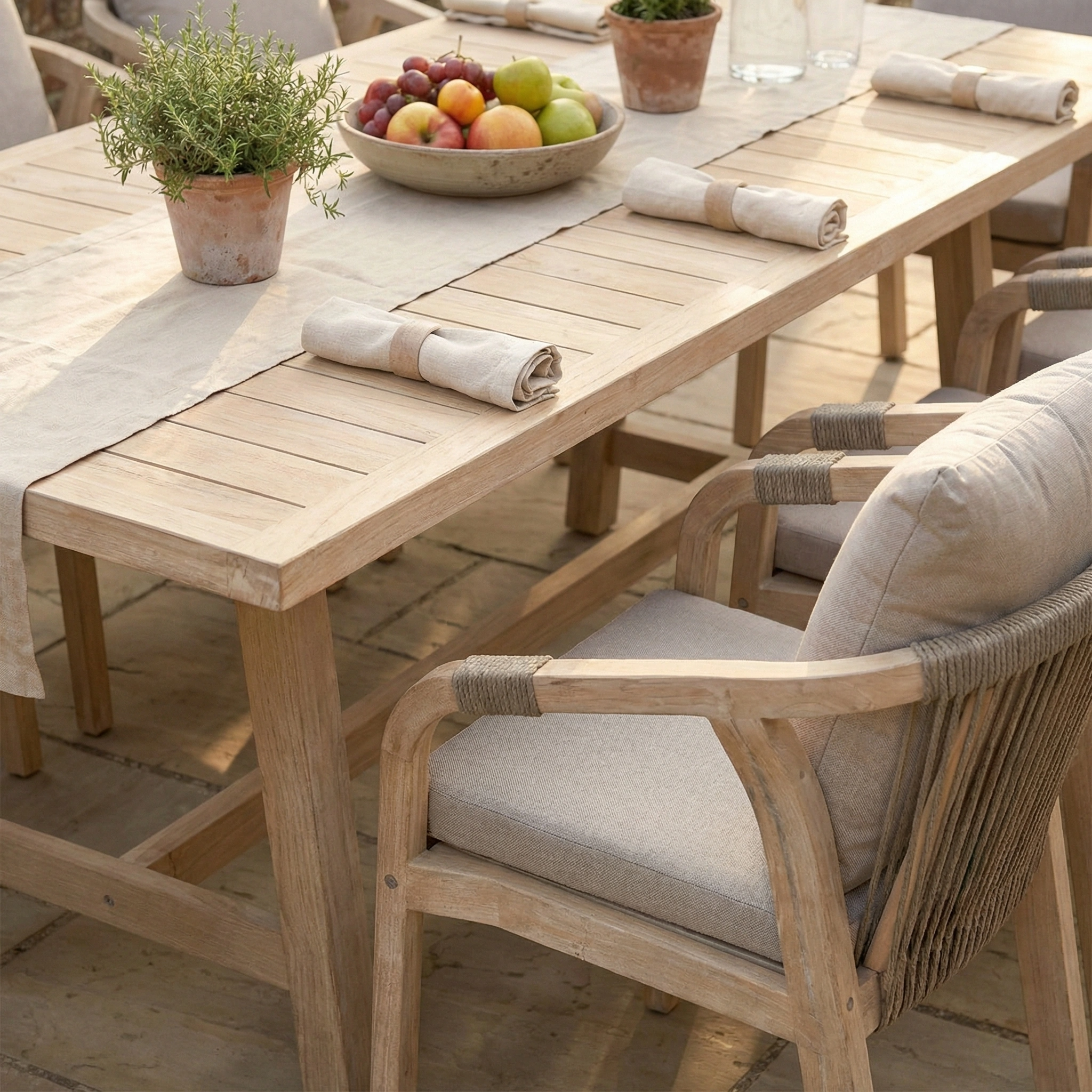 Quay 8 Seat Rectangular Dining Set in Mocha: Wooden garden furniture, perfect for outdoor dining with family or friends. Includes seating for eight and suits settings with fresh fruit or a rosemary plant.