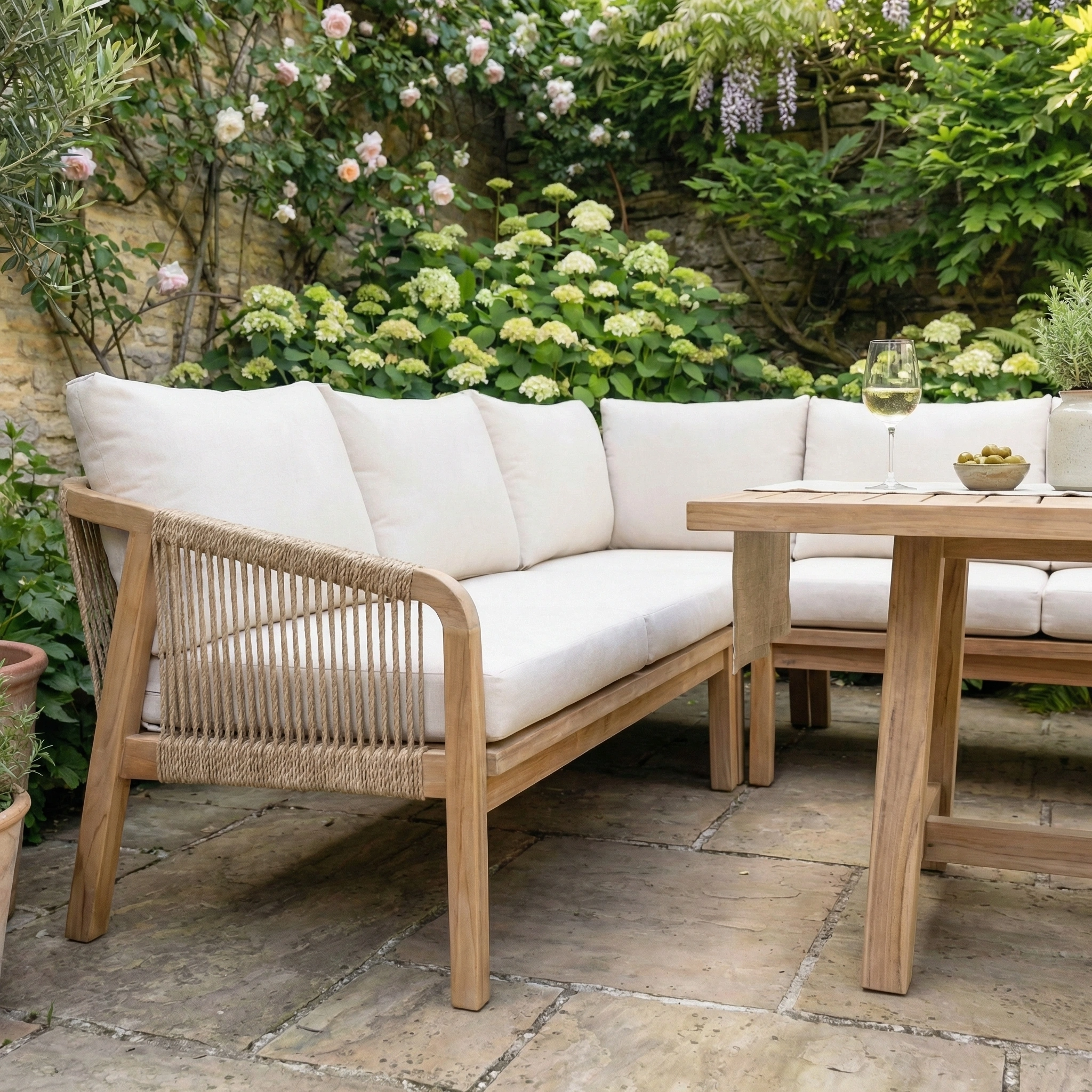 Create a relaxing retreat with the Quay Corner Dining Set with Armchair in Linen—featuring comfy cushions, a modern table, and ideal for enjoying your garden views.