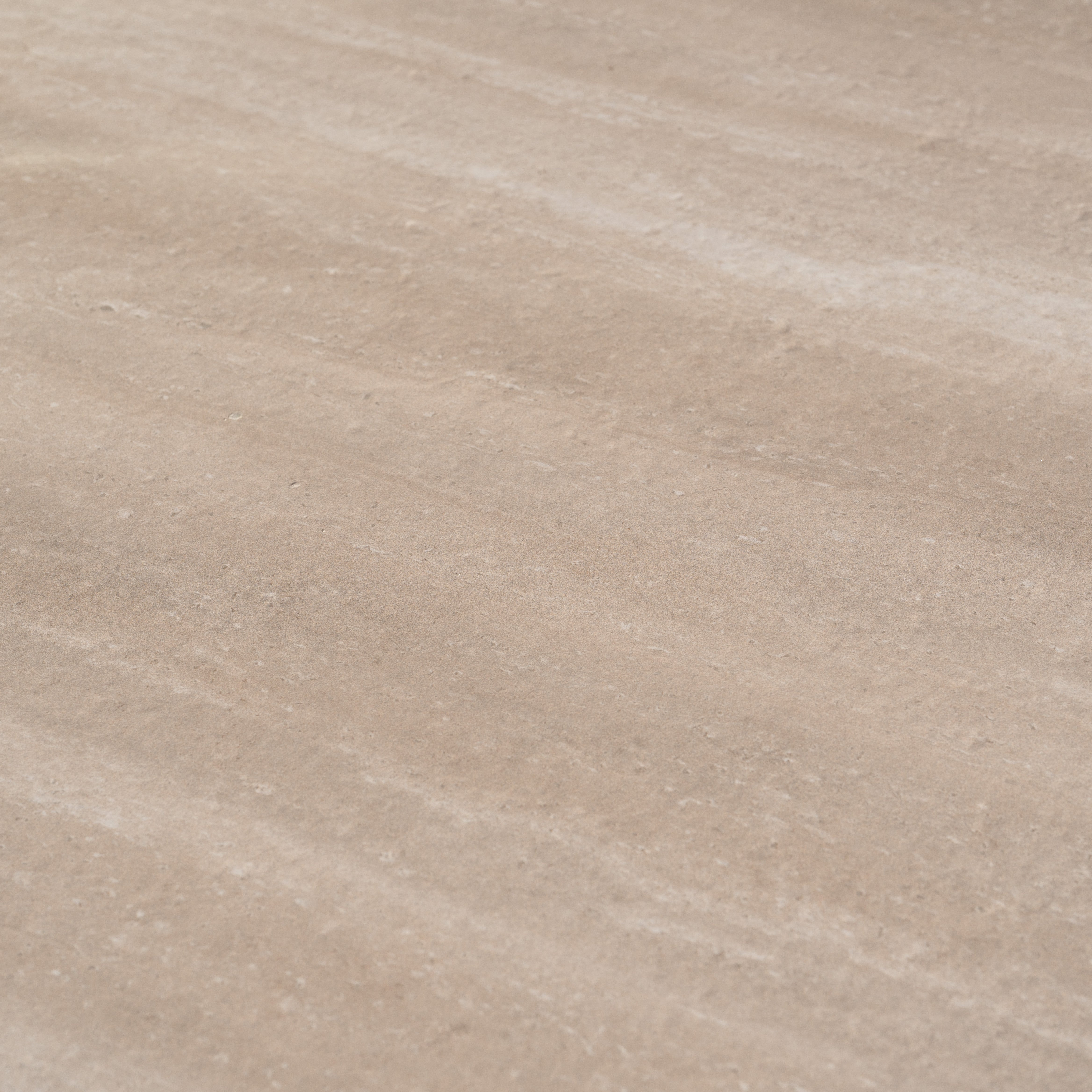 Textured beige stone surface with subtle natural patterns and horizontal lines, providing an ideal backdrop for aluminium garden furniture or the Rhea 2 Seat Sofa Set in Latte in your outdoor setting.