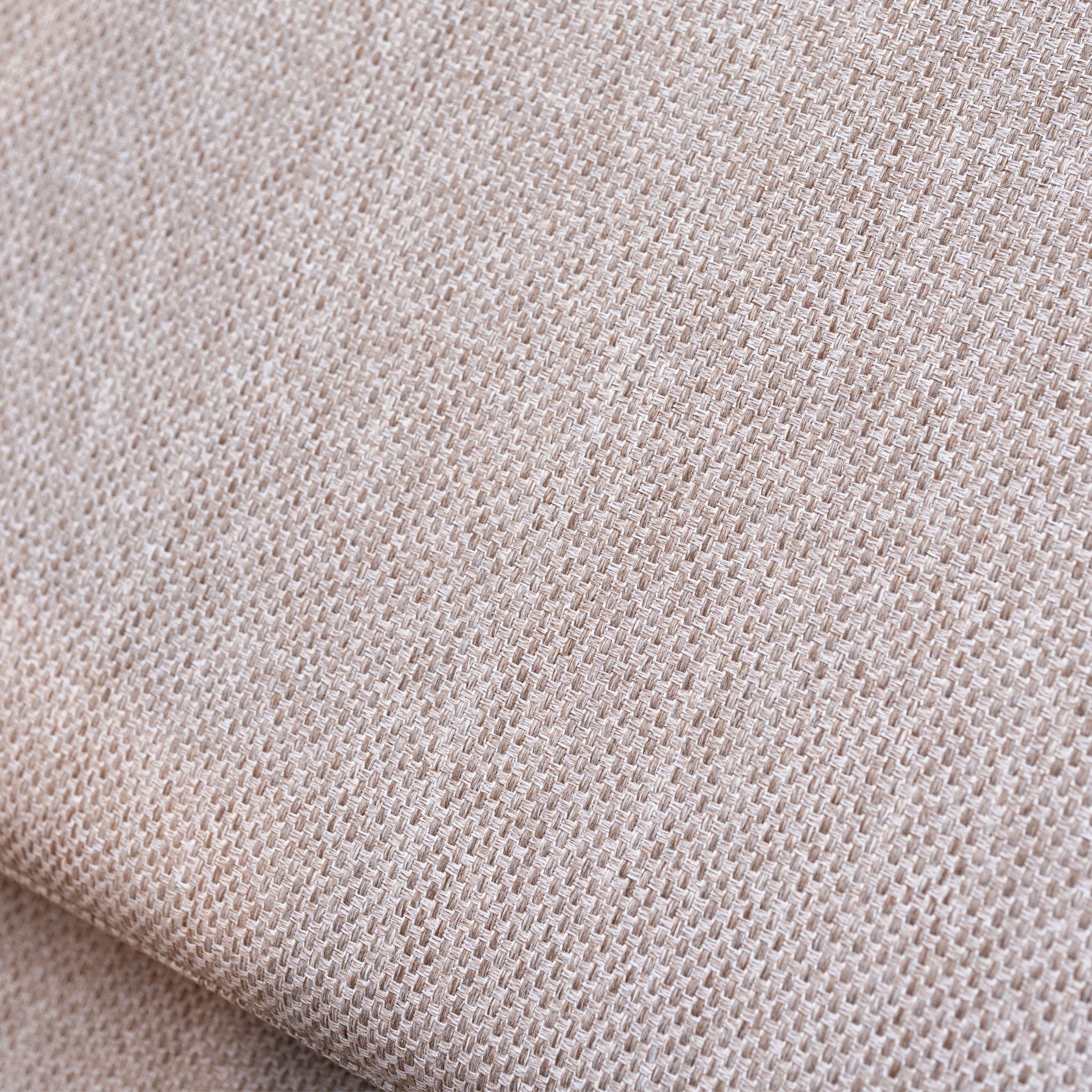 Close-up of textured beige woven fabric and visible threads on the Sofia Sunlounger with Headrest and Wheels in Putty, perfect for enhancing your outdoor space.