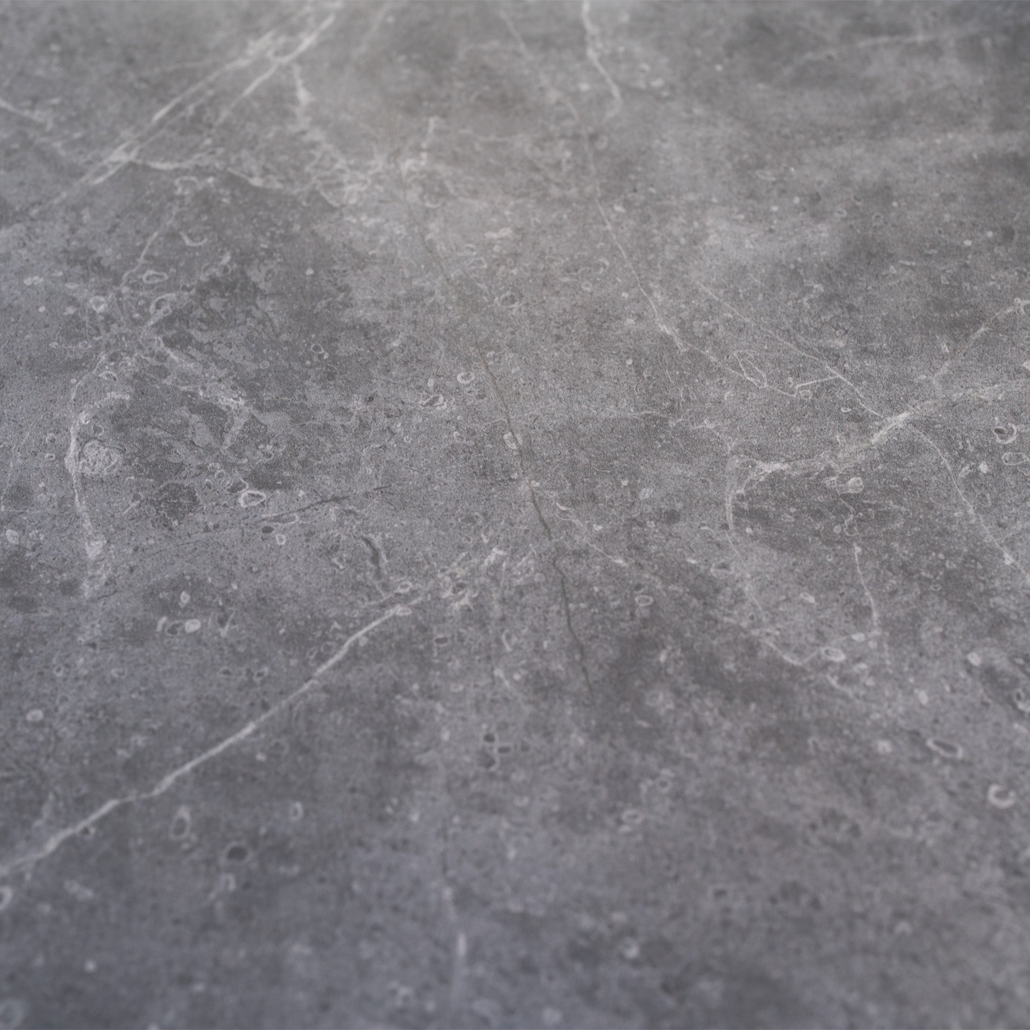 Gray marble surface with subtle white veins and natural texture, perfect for complementing your Sorelli Corner Sofa Set in Truffle or any outdoor sofa set as elegant garden furniture.