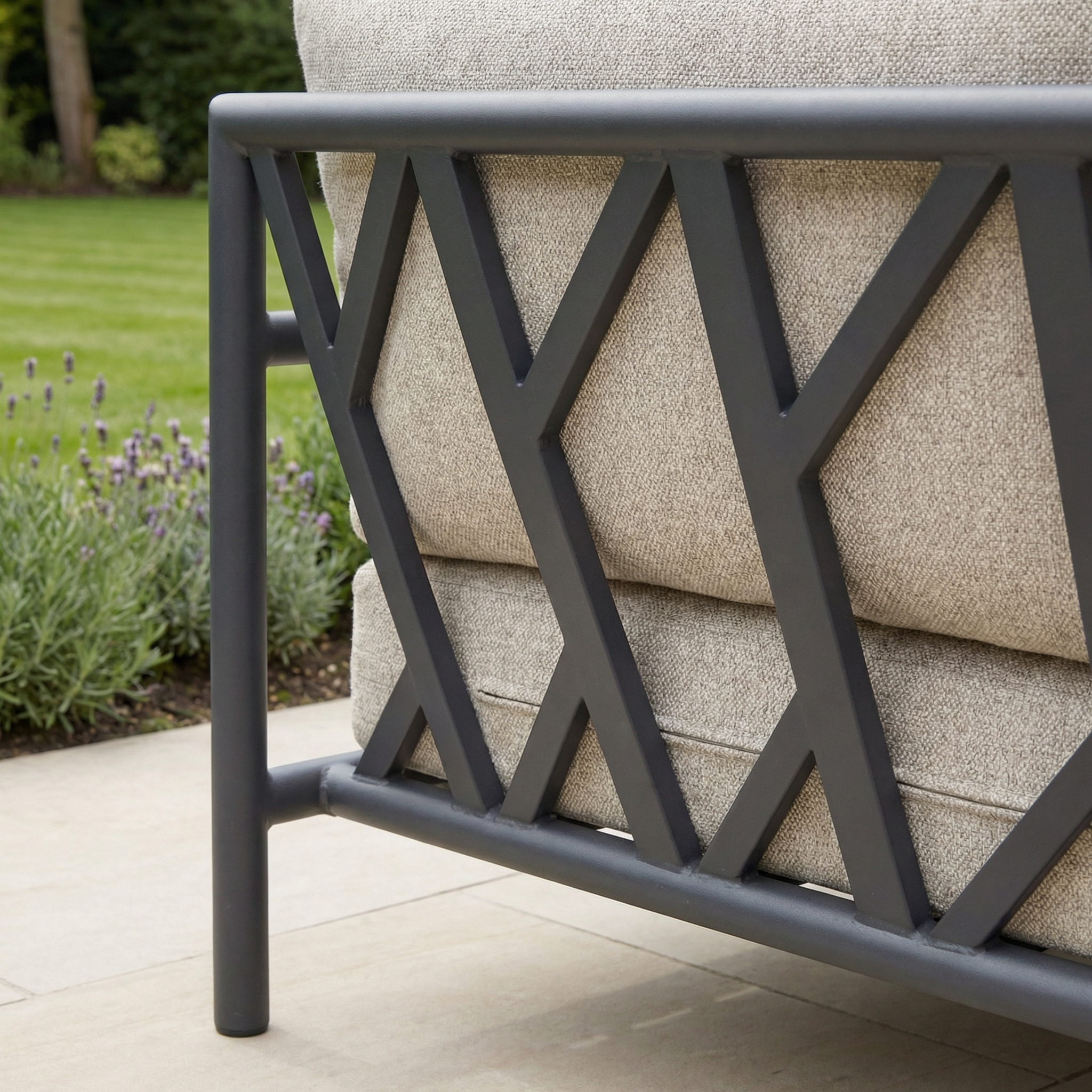 Close-up of the Sorelli U Shape Corner Sofa Set in Truffle, featuring a gray frame with geometric design and beige weather-resistant cushions—ideal for outdoor entertaining in your garden.