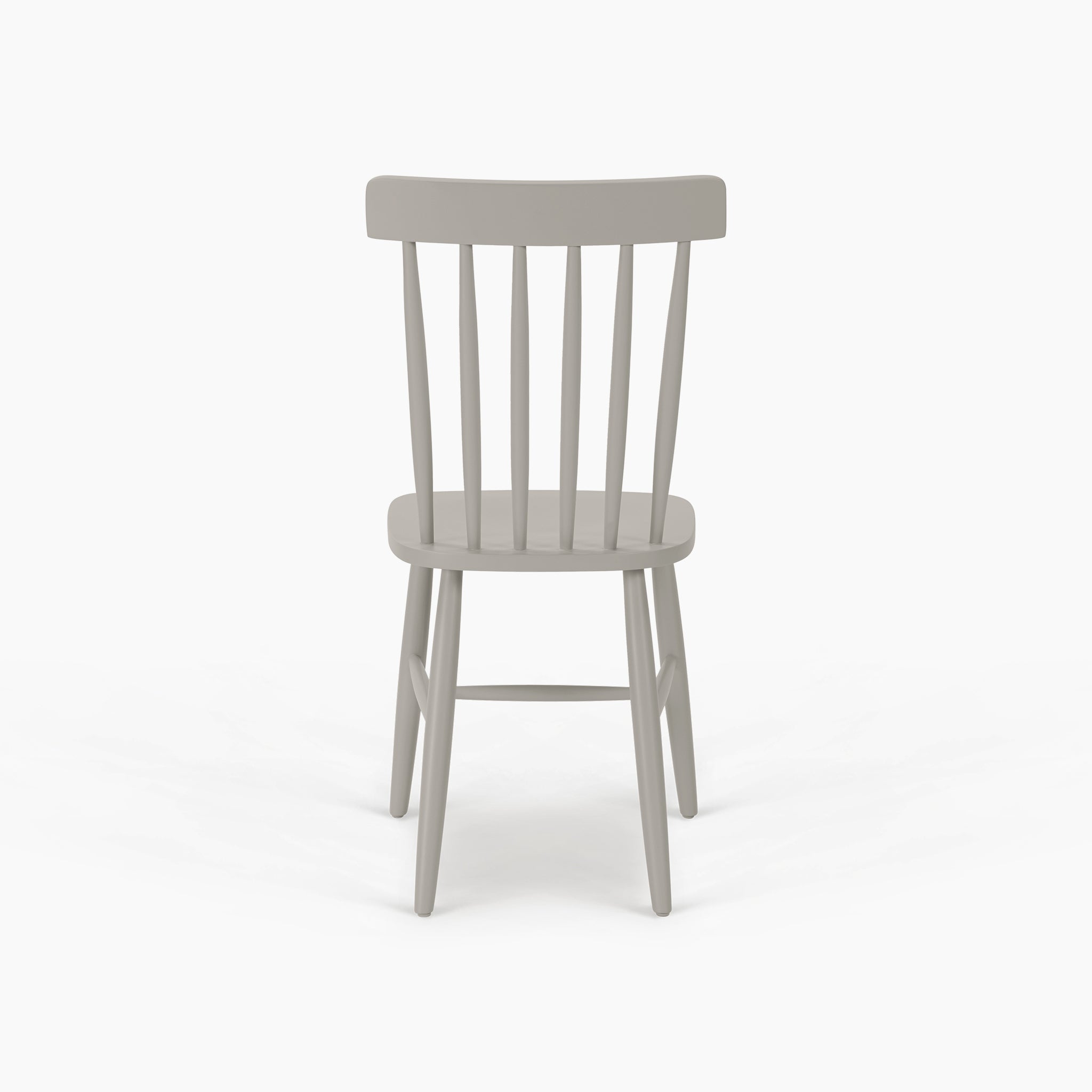 The Burford Set of 2 Spindleback Dining Chairs in Pebble Grey features vertical slats and a gray wooden frame, shown from behind against a white background—a modern country dining chair for any stylish setting.