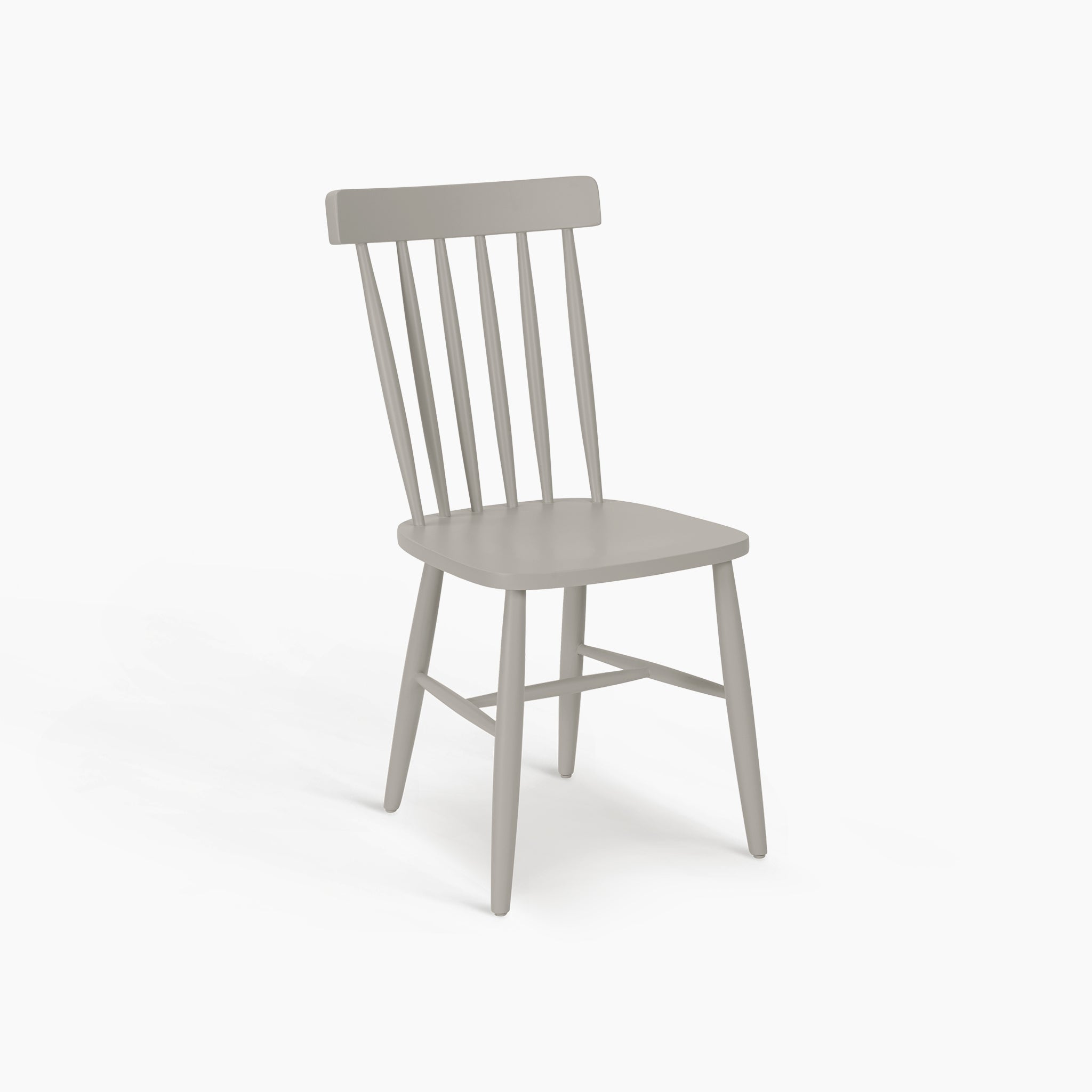 The Burford Set of 2 Spindleback Dining Chairs in Pebble Grey features a slatted backrest and four angled legs, offering the perfect modern country style for your dining space, shown here on a white background.