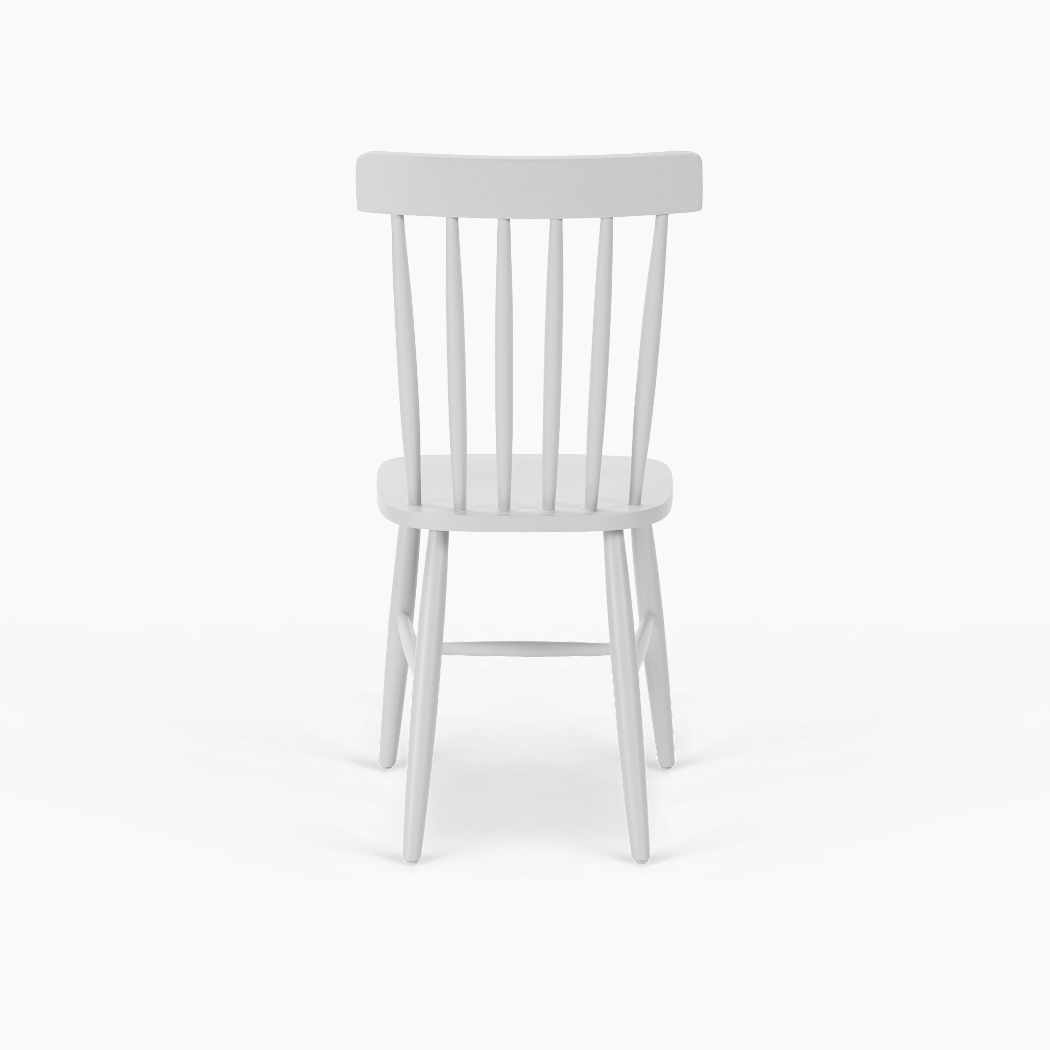 The Burford Set of 2 Spindleback Dining Chairs in Warm White features classic country style with vertical backrest slats, shown against a plain white background.
