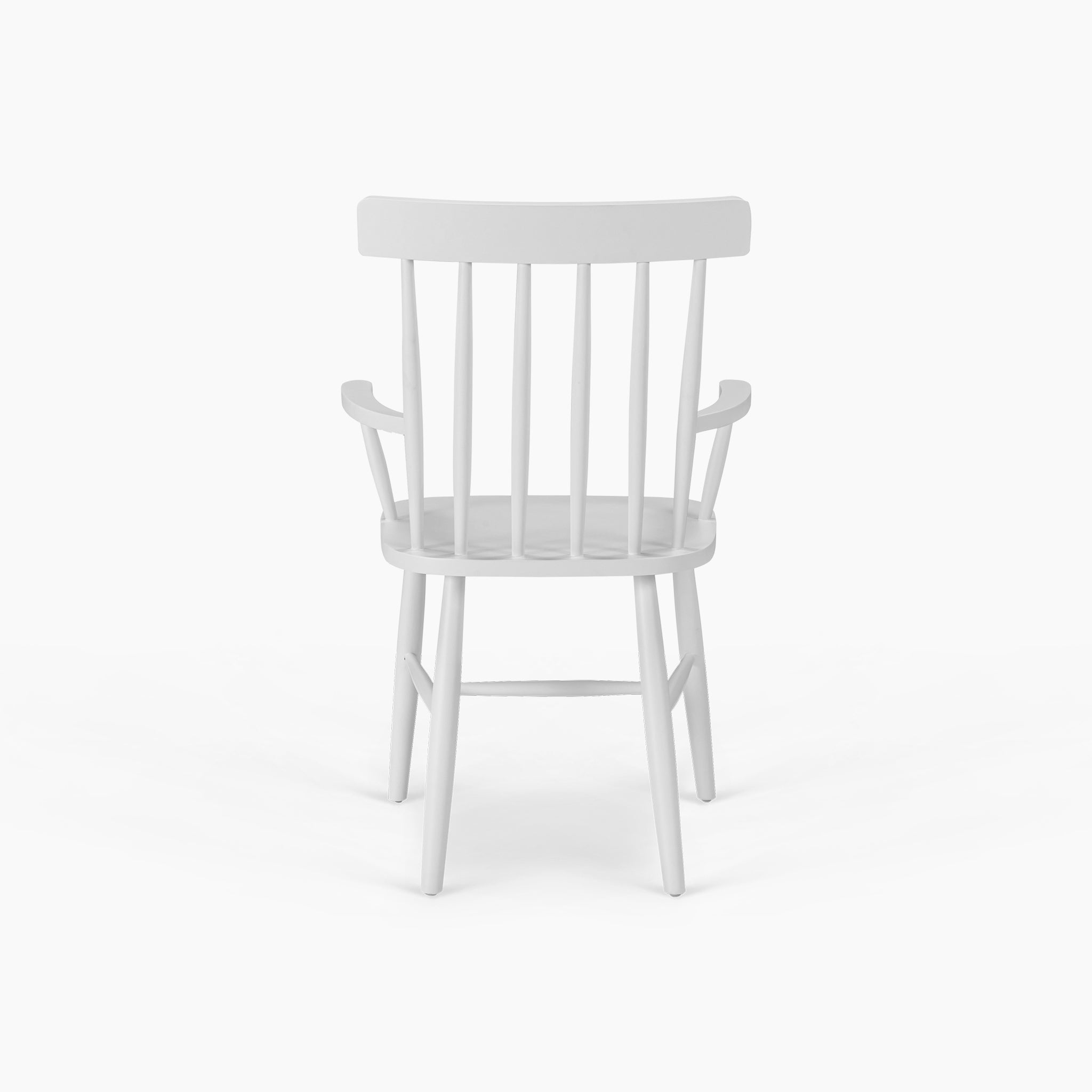 The Burford Spindleback Dining Chair with Armrest in Warm White features vertical slats and armrests, elegantly shown from the back on a white background. Its warm white finish adds inviting charm to any space.