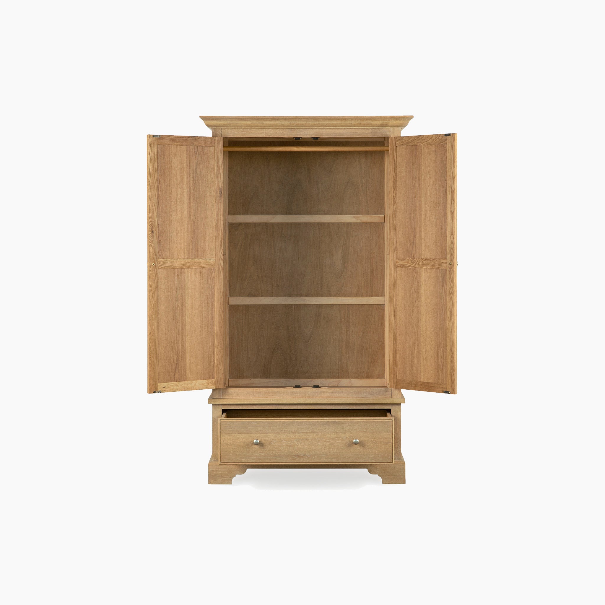 The Amberley Double Wardrobe in Light Oak features two open doors, two spacious shelves, and a bottom drawer—an elegant piece for any solid oak bedroom furniture collection.