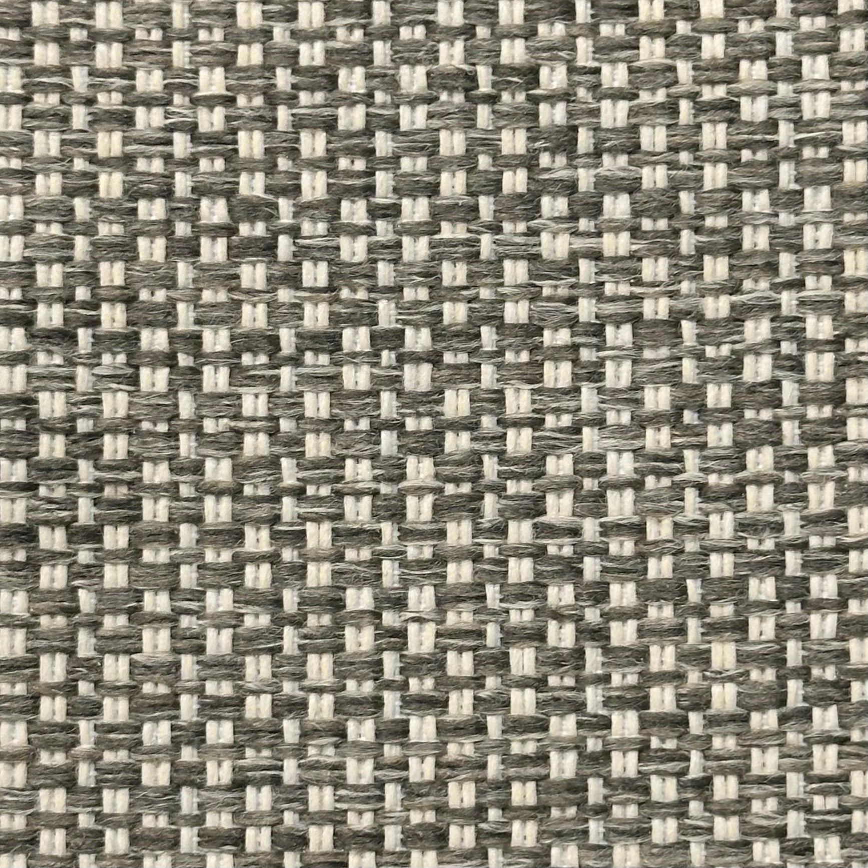 Close-up of Two-tone Latte fabric, featuring a tight, grid-like woven pattern in gray and beige.