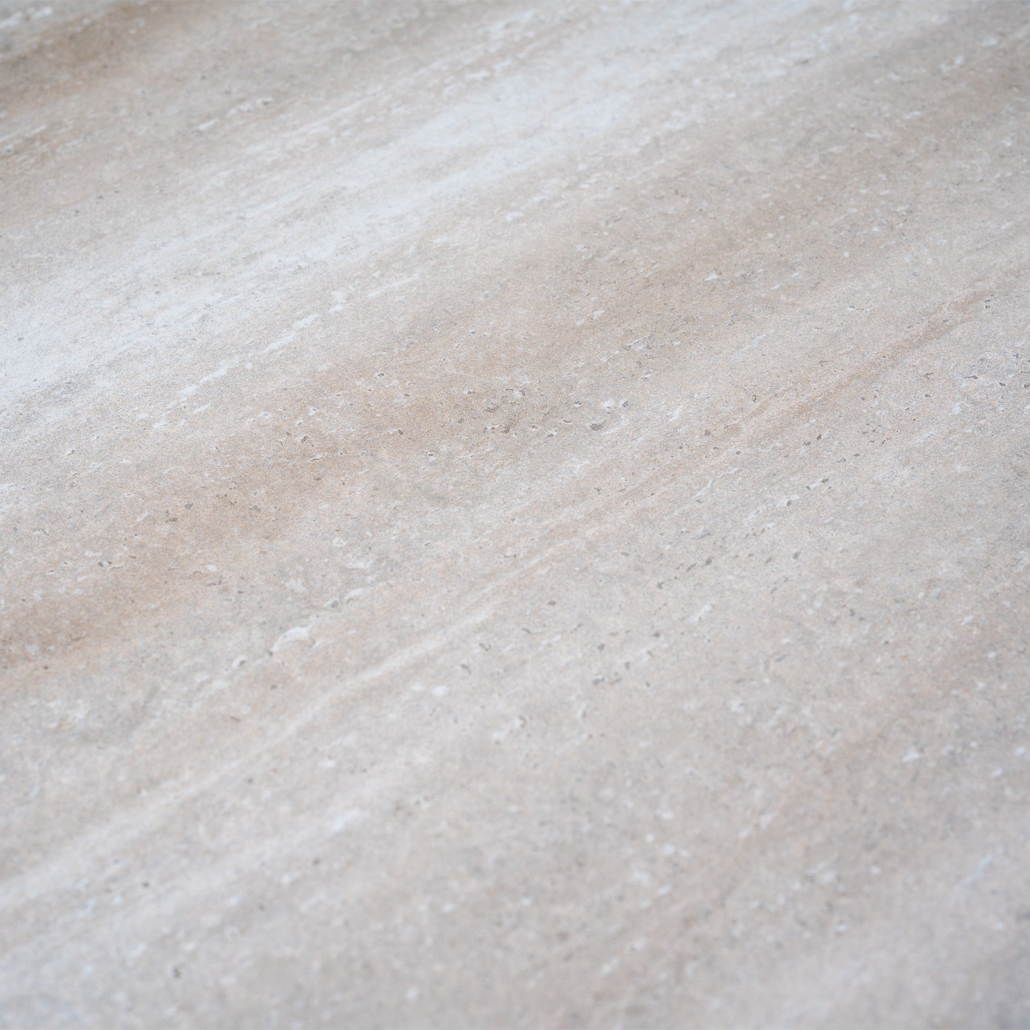 Beige stone surface with subtle veining and a smooth, matte finish—perfect for pairing with the Luna 6 Seat Outdoor Fabric Dining Set with Albatross Extending Table in Fawn.