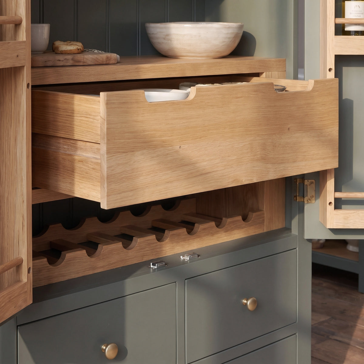a wooden cabinet with a drawer and a bowl on top