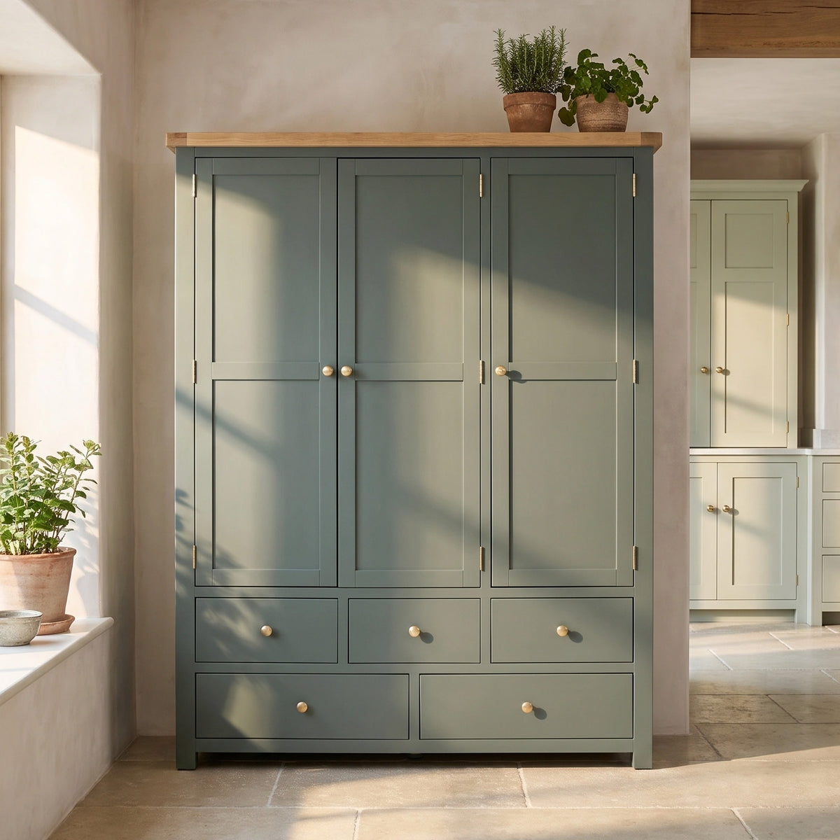 a large cabinet with plants on top
