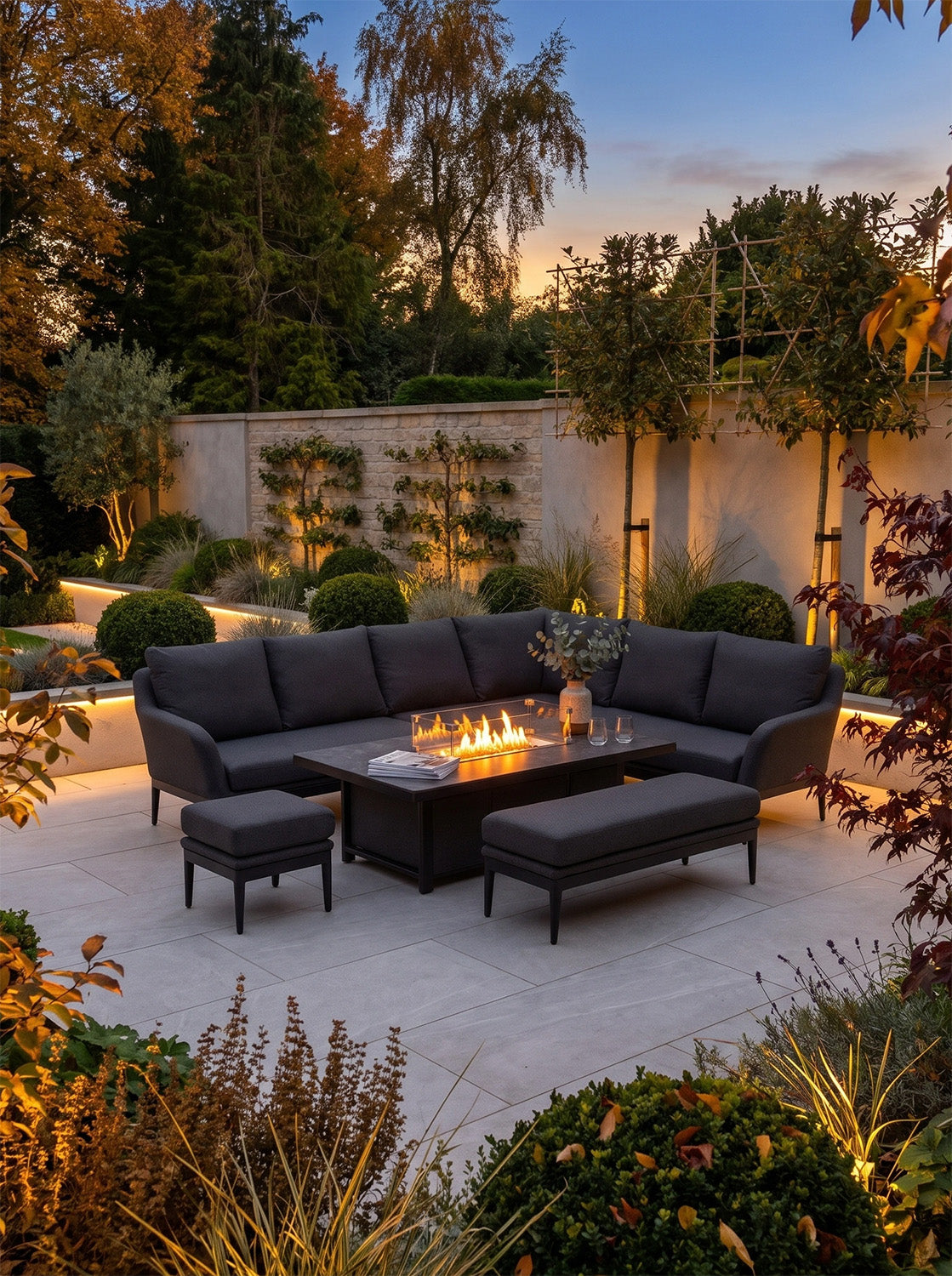 a patio with a fire pit