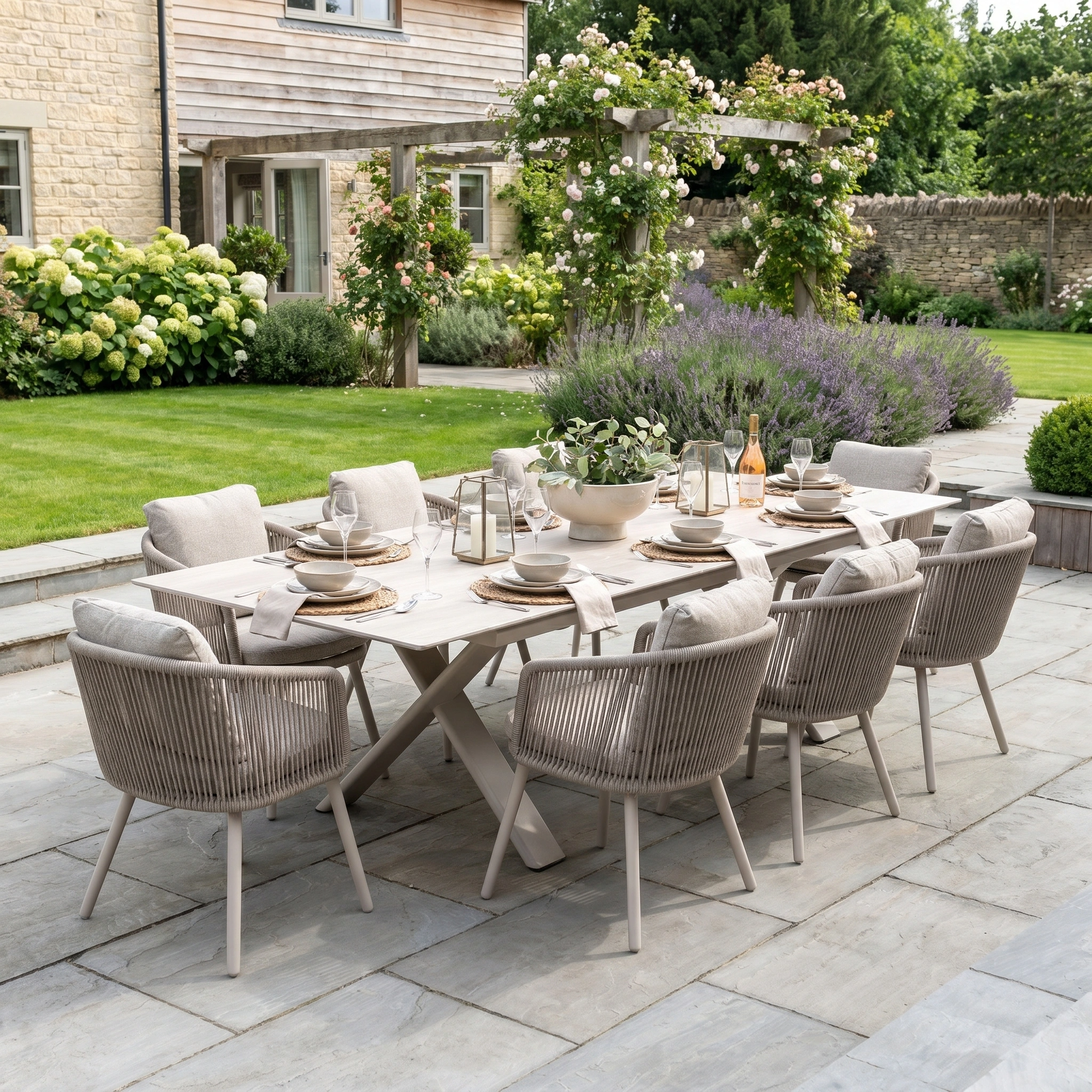 Enjoy garden meals with the Dekota 8 Seat Rope Dining Set, featuring an Albatross Extending Table in Fawn and eight cushioned chairs. Scratch- and UV-resistant for enduring outdoor style on your patio.