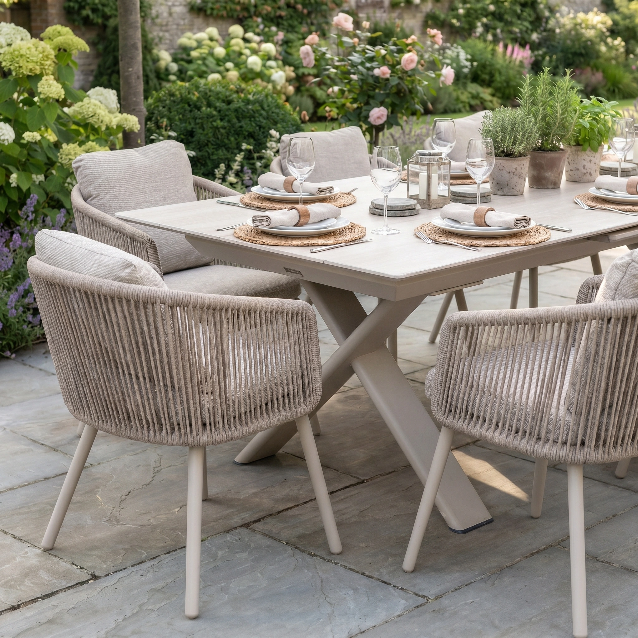 The Dekota 8 Seat Rope Dining Set with Albatross Extending Table in Fawn features scratch and UV-resistant aluminium, combining style and durability for outdoor dining in your garden.