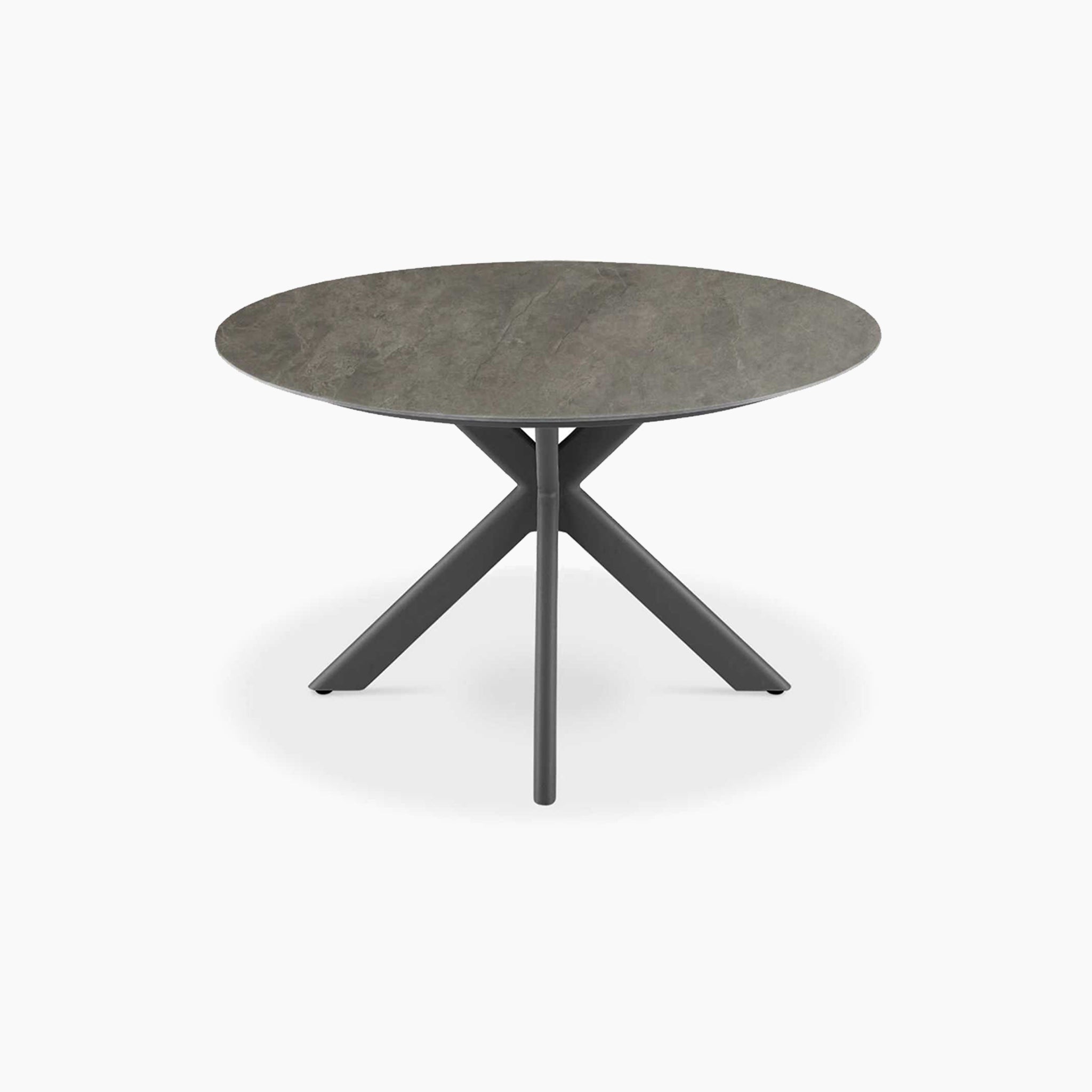 The Albatross 4 Seat Round Dining Table in Charcoal features a dark sintered stone top and three angled black legs; weather resistant, with an aluminium frame for durability, it's ideal for outdoor use.