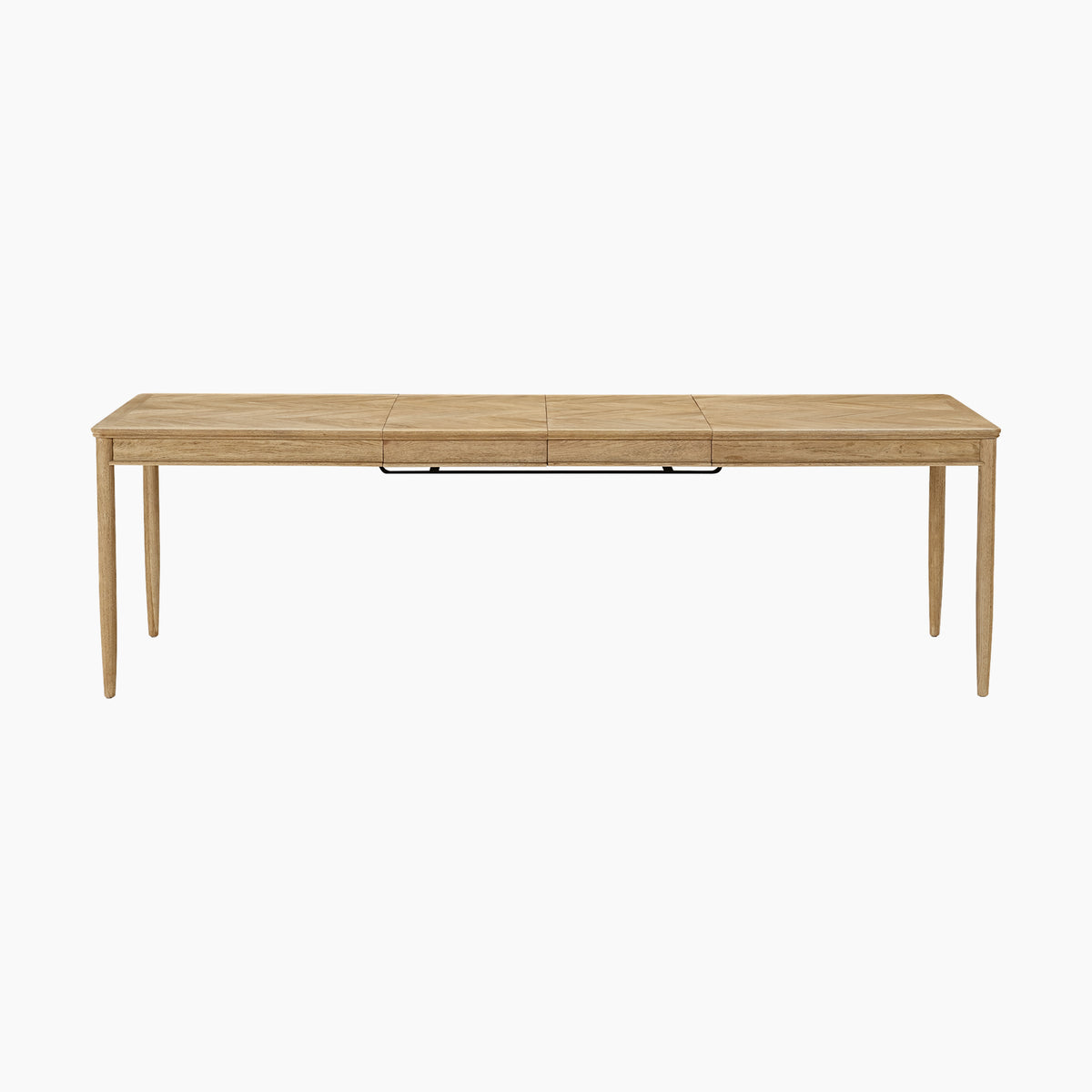 The Hadley Herringbone 6-8 Extending Dining Table in Natural, featuring a light wood rectangular design with barrel legs, is pictured against a plain white background.