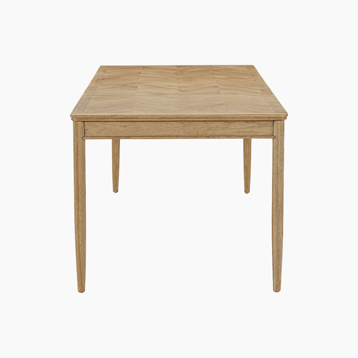 Hadley Herringbone 6-8 Extending Dining Table in Natural, featuring a rectangular wooden design with barrel legs, viewed from the short end against a white background.