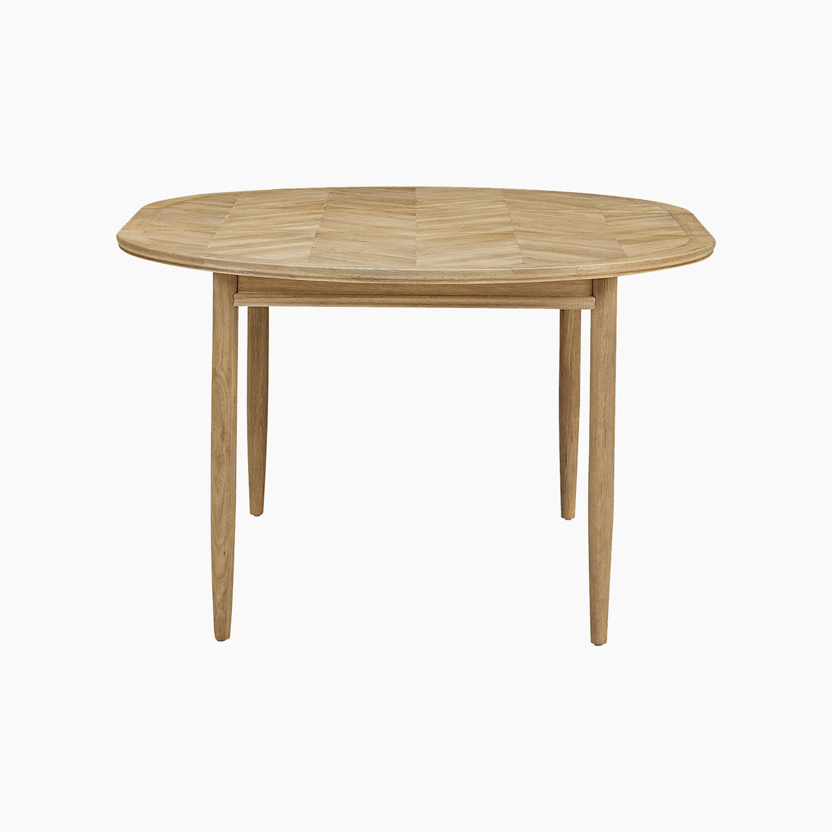 Round, light wood dining table with four barrel legs, viewed from the front against a plain white background. The Hadley Herringbone 4-6 Round Extending Dining Table in Natural draws inspiration from classic round oak tables and showcases timeless elegance in its design.