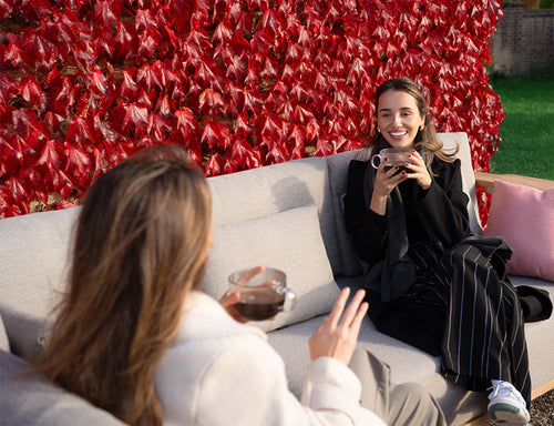 a group of women sitting on a couch