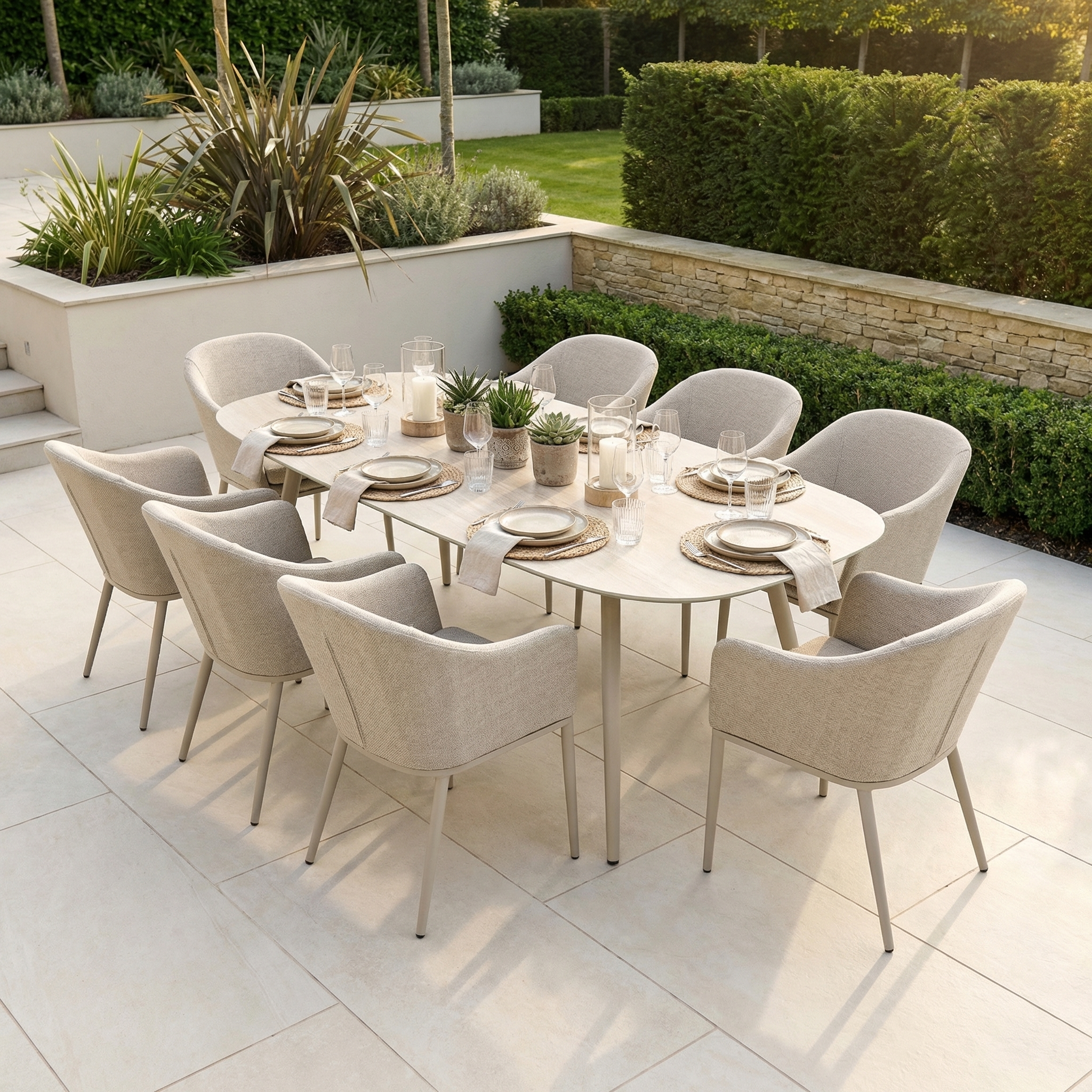 The Luna 8 Seat Outdoor Fabric Oval Ceramic Dining Set in Fawn features eight beige chairs and an oval table—perfect, stain-proof garden furniture for stylish al fresco dining on your patio.