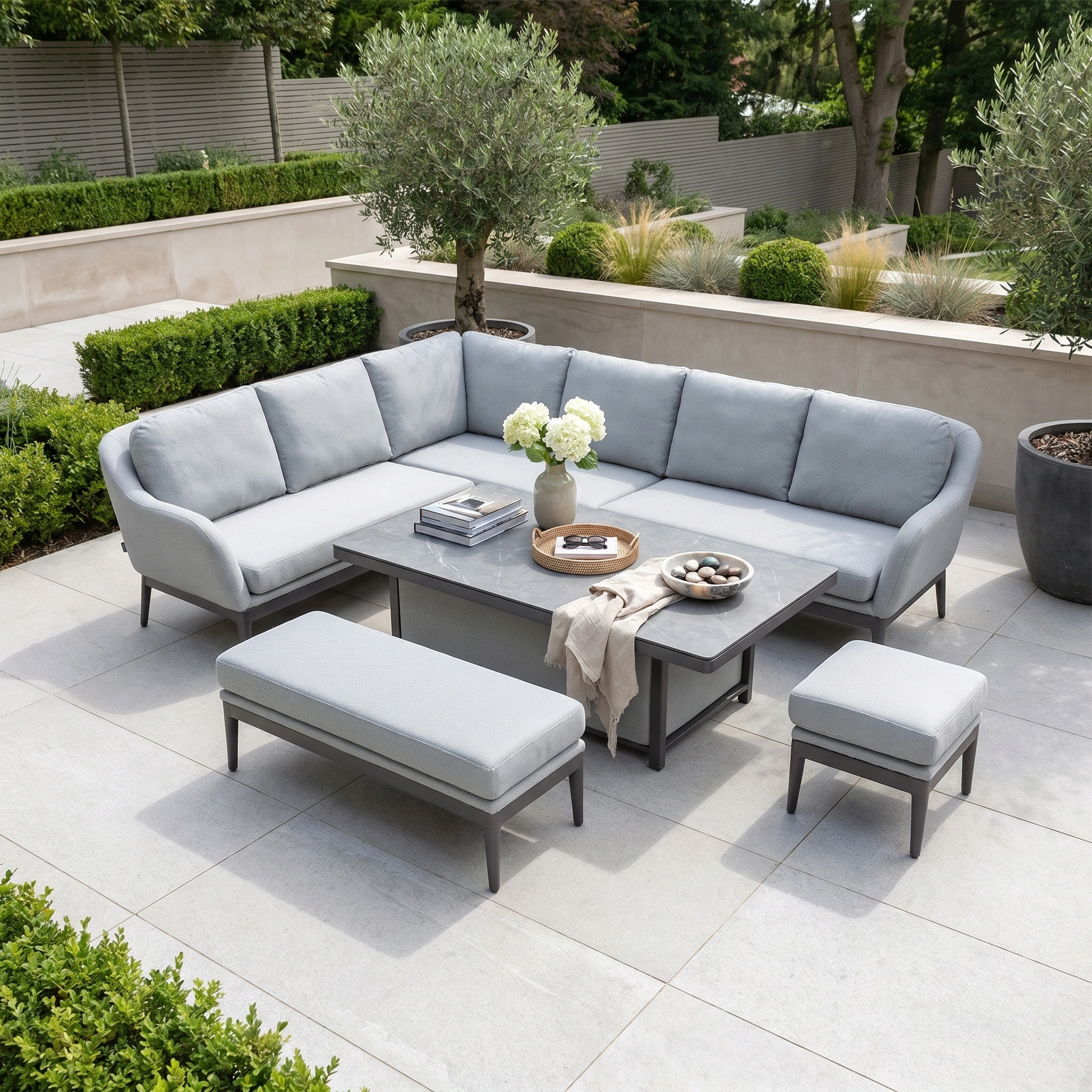Create a serene patio with the Luna Outdoor Fabric Rectangular Corner Dining Set with Rising Table in Oyster Grey (Left Hand)—a modern, maintenance-free garden furniture setup perfect for stylish outdoor dining and relaxation.
