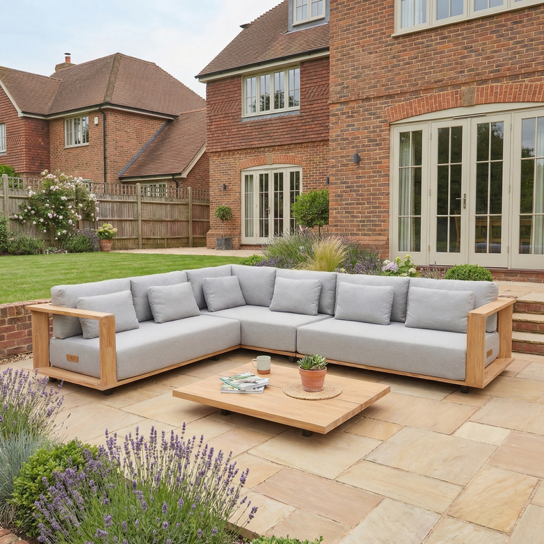 Transform your patio with the Eternity Left Hand Teak Corner Group in Light Grey, a modular sectional that combines teak durability and stylish comfort—perfect for enhancing any outdoor space.
