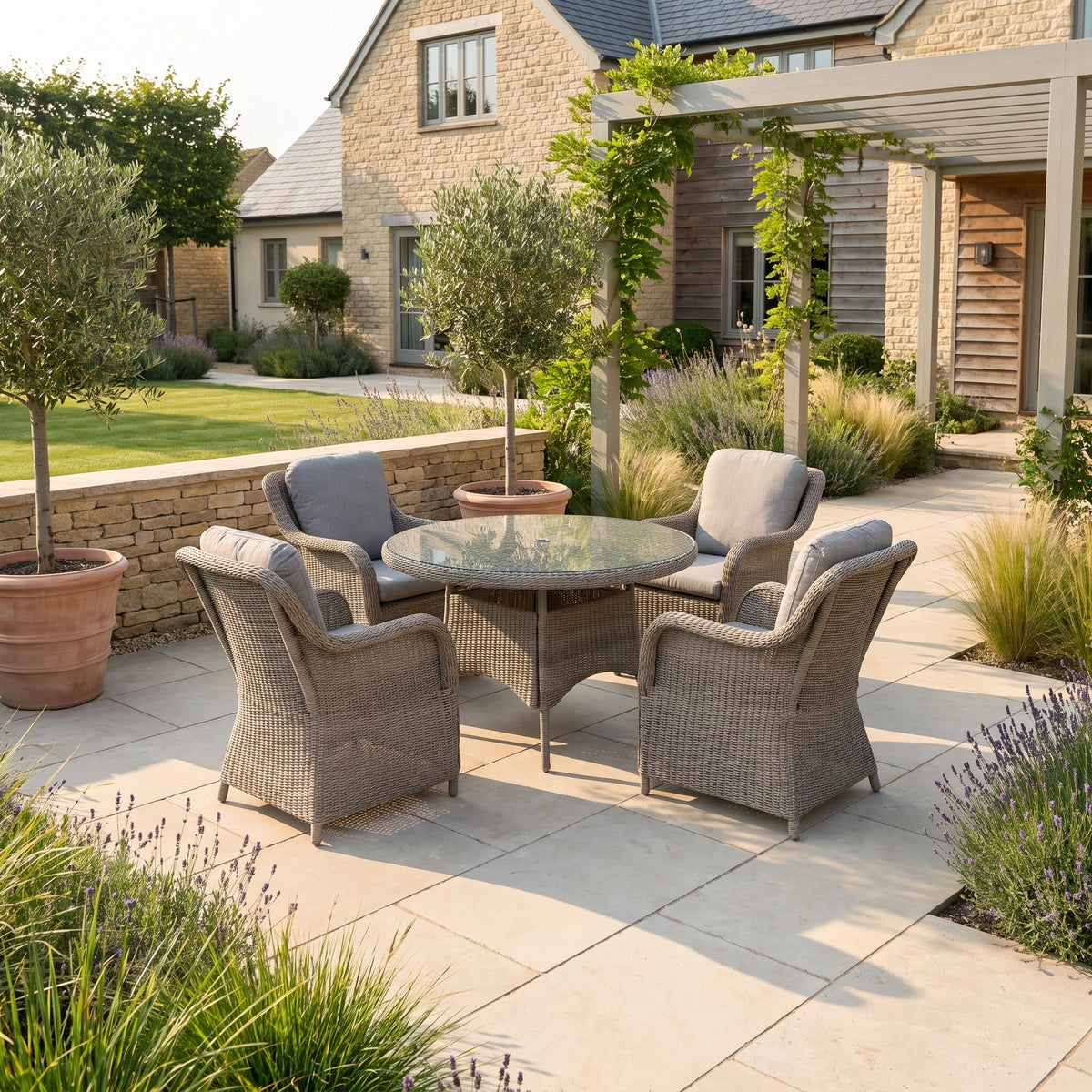 a patio with a table and chairs