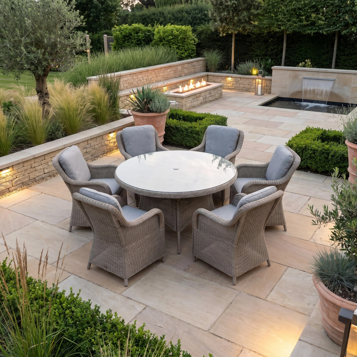 a patio with a table and chairs