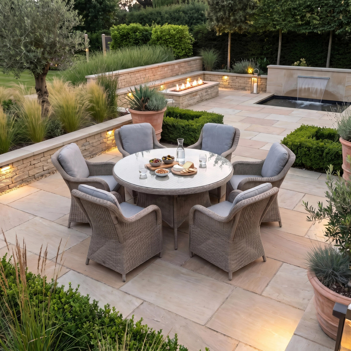 a patio with a table and chairs