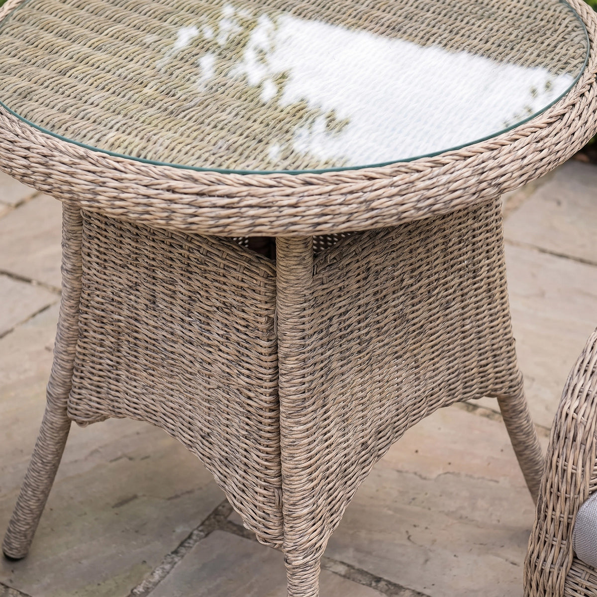 a wicker table on a patio