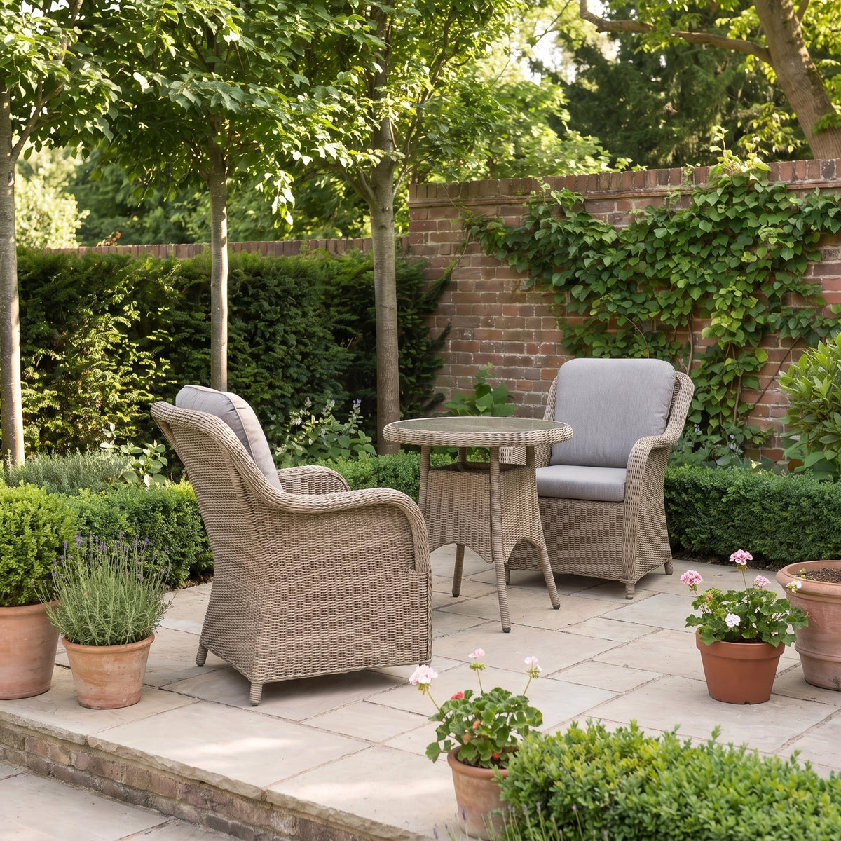 a patio with chairs and a table