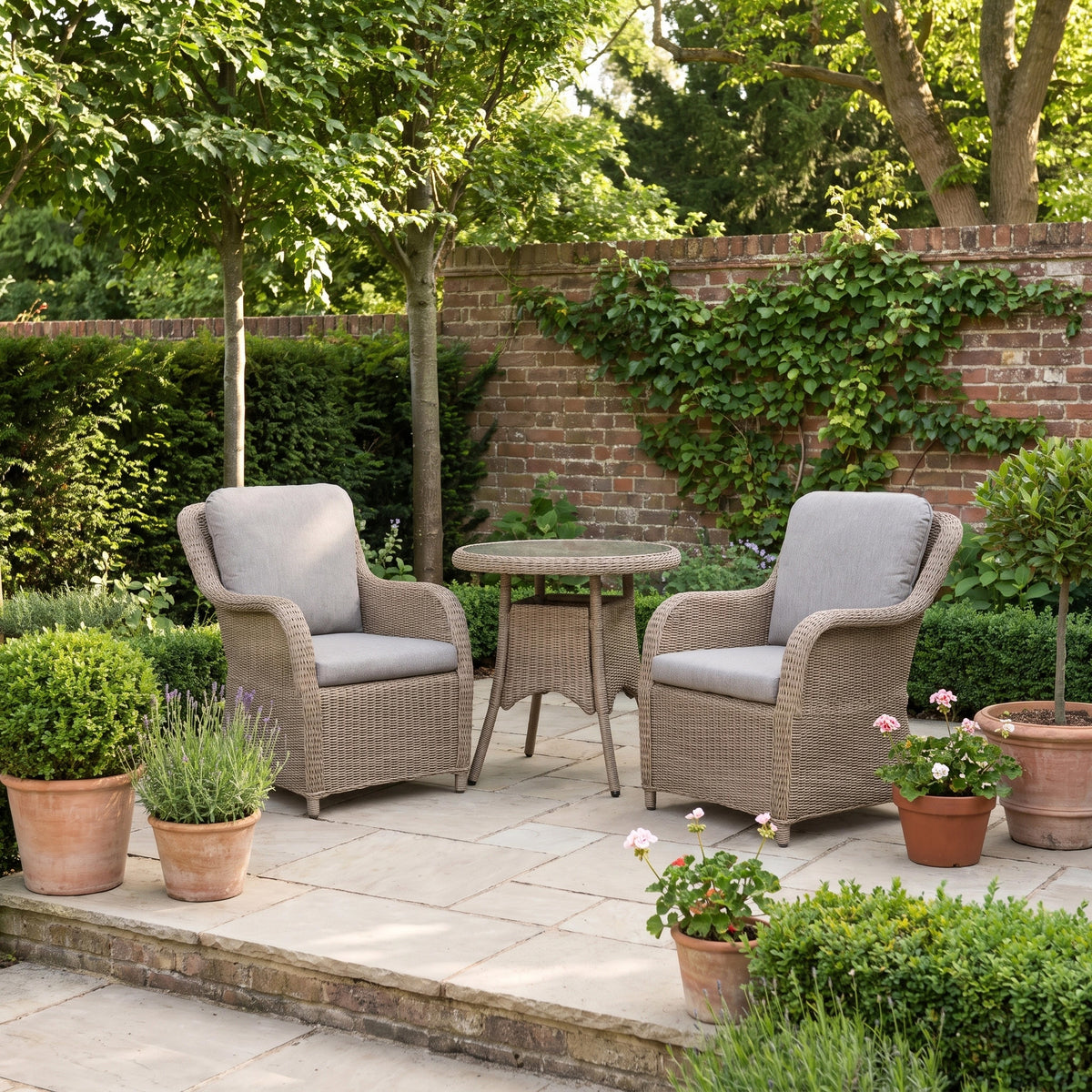 a patio with chairs and a table