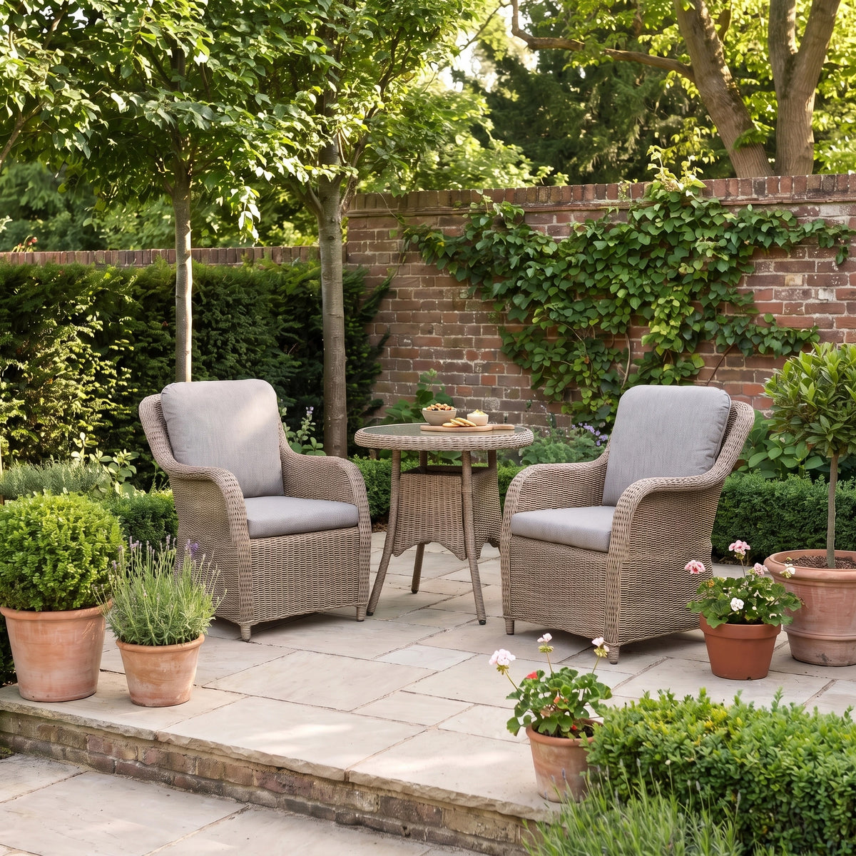 a patio with chairs and a table
