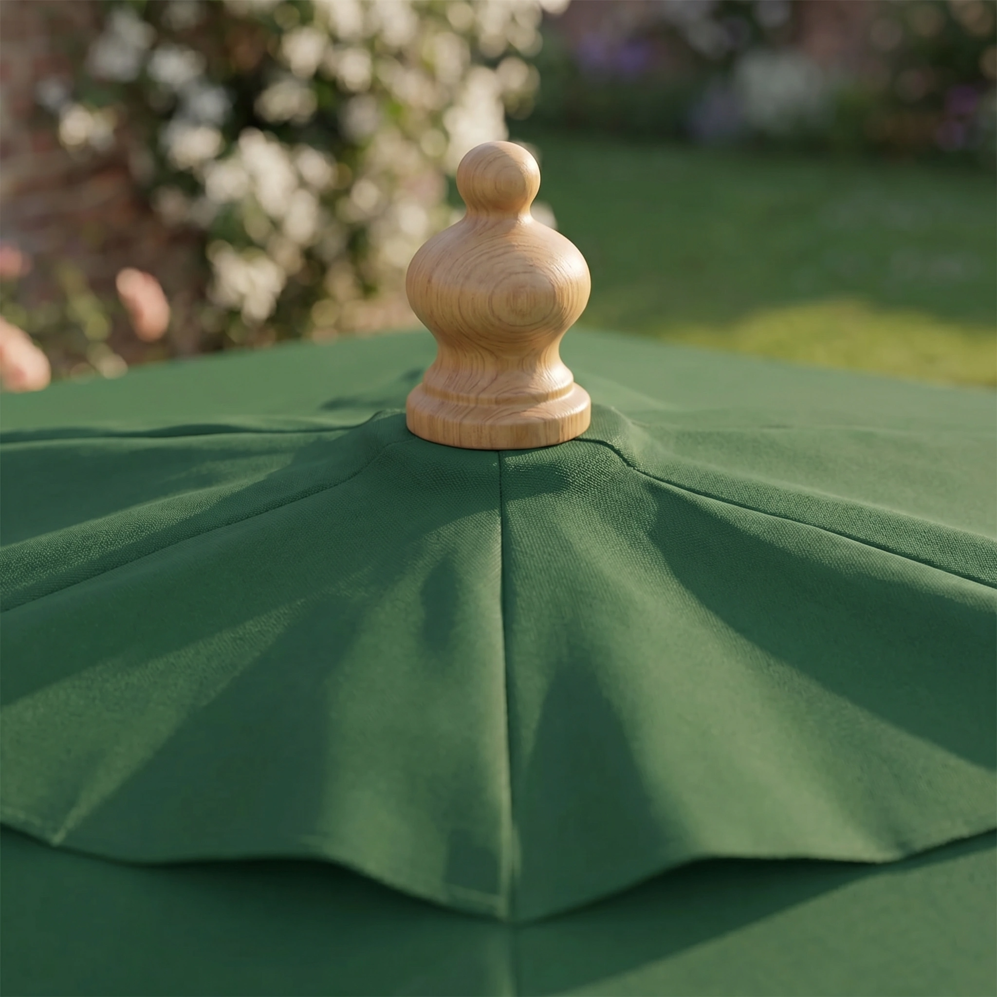 The Kratos 3m x 2m Rectangular Wooden Parasol in Green, featuring a wooden finial, offers stylish sun protection for your garden.