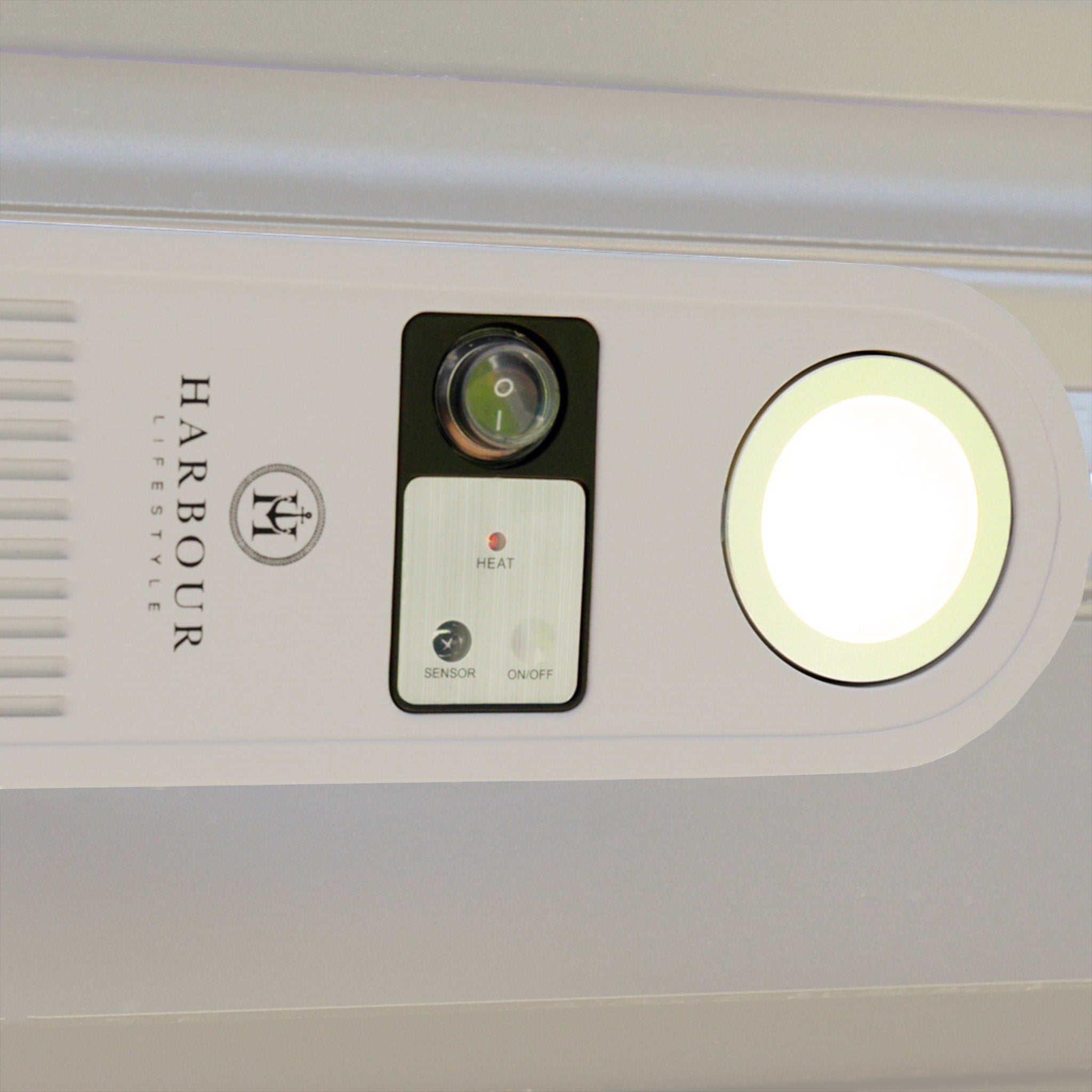 Close-up of the FREE PergoSTET Wifi & Bluetooth Heater in Latte, featuring a white control panel with a glowing light, power switch, and HARBOUR LIFESTYLE branding—ideal for heating pergola ceilings.