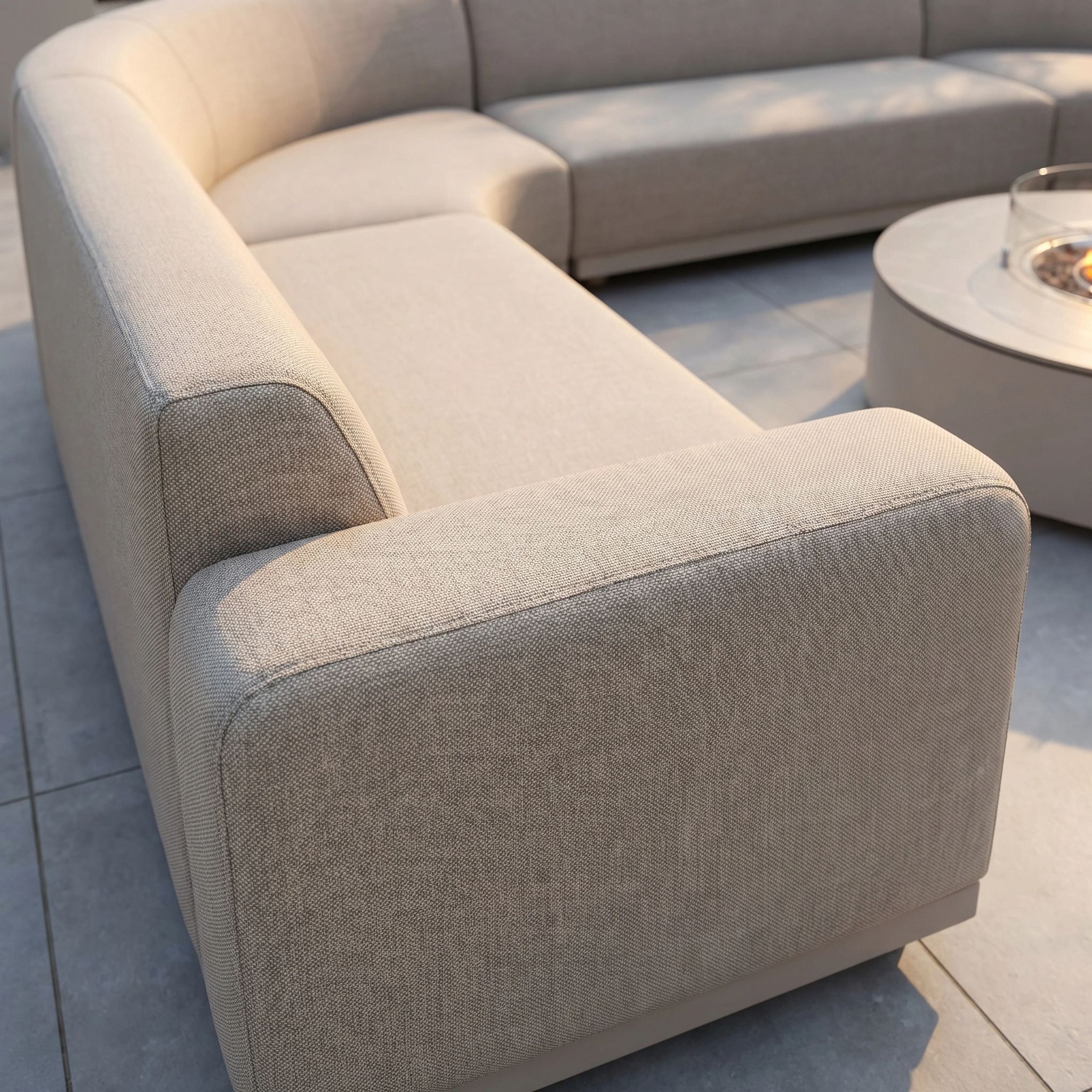 The Luna U-Shape Outdoor Fabric Curved Corner Group in Fawn features a modern sectional design and includes a round firepit coffee table.