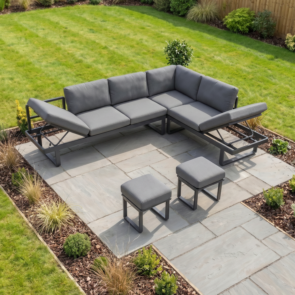 Lyra Corner Dining Set in Charcoal features cushioned seats, a dining table, and stools—this stylish garden furniture is perfect for enhancing any stone patio.