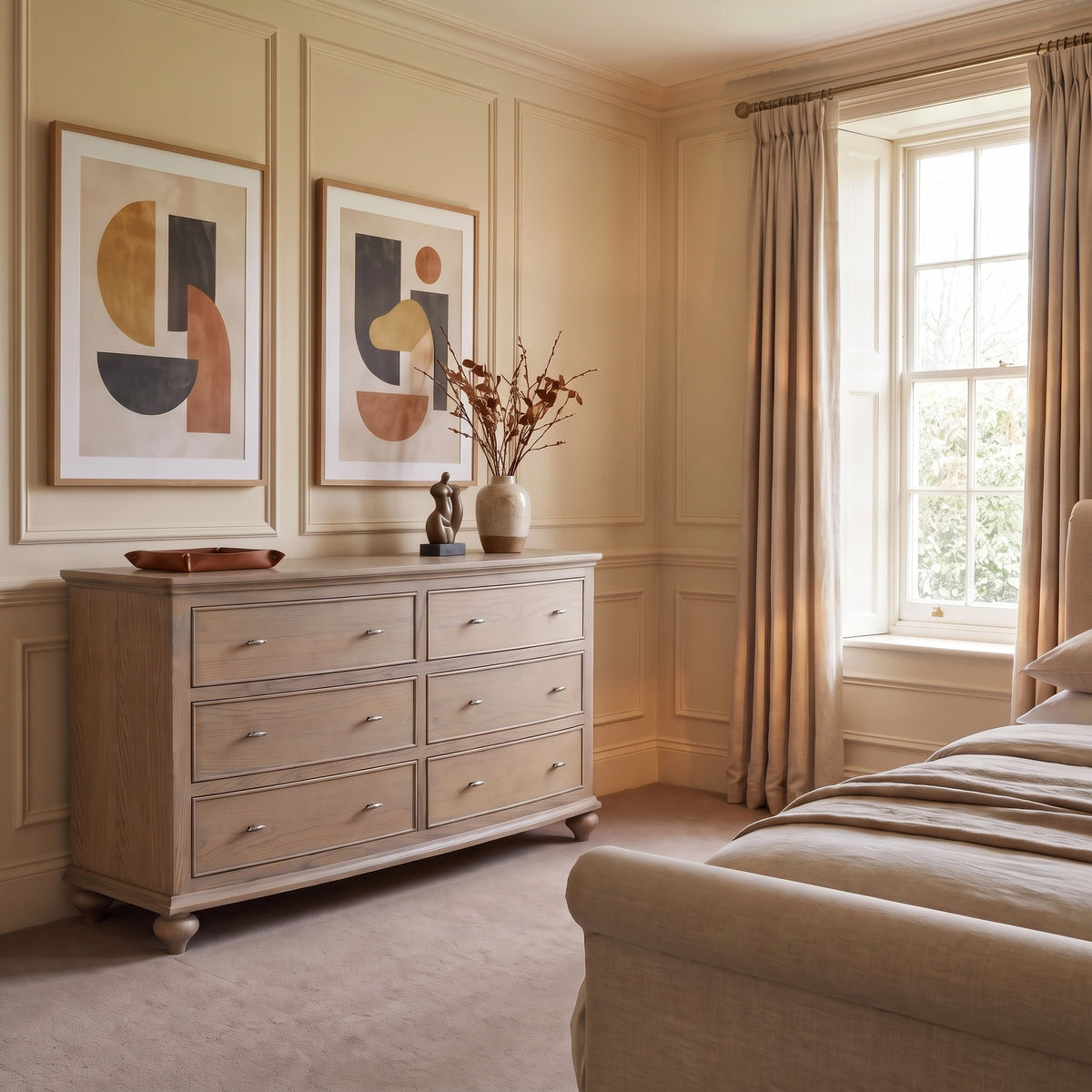 a bedroom with a bed and a dresser
