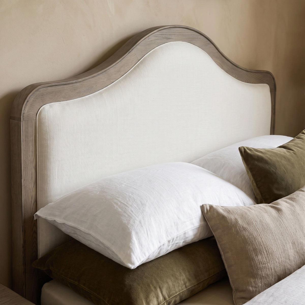 a bed with pillows on it