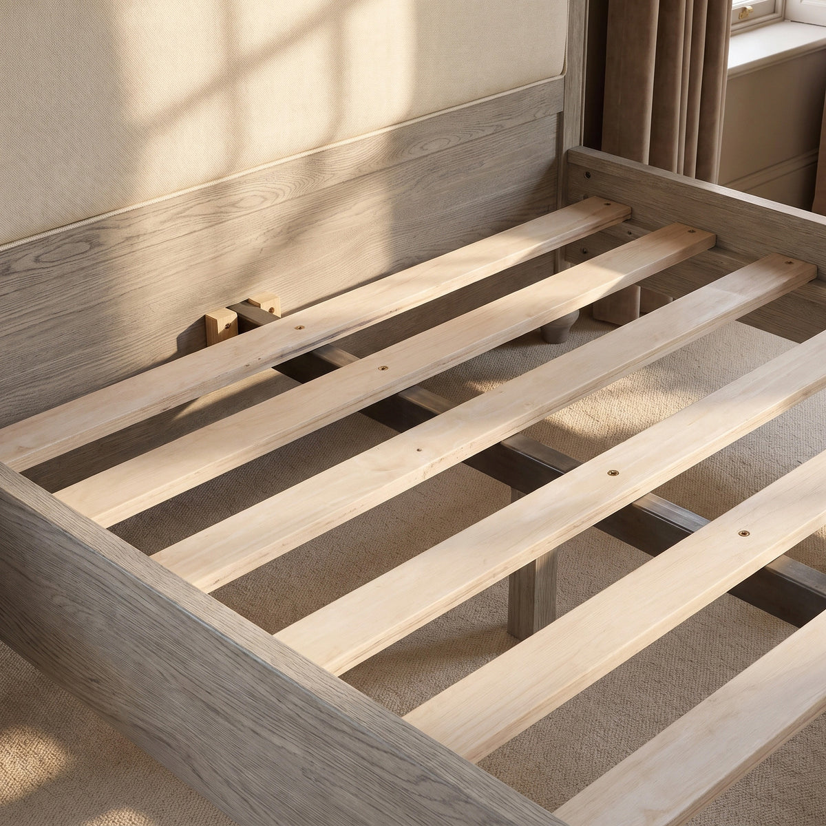 a wooden bed frame with no mattress