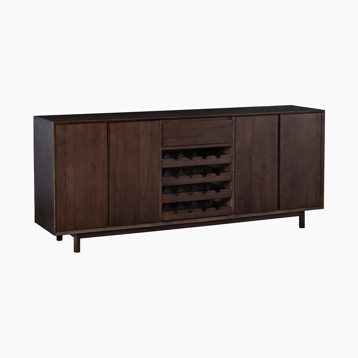The Oslo Grand 4 Door Sideboard with Wine Rack in Walnut features a rich dark wood finish, two cabinets, a drawer, and a central wine rack, elegantly displayed against a white background.